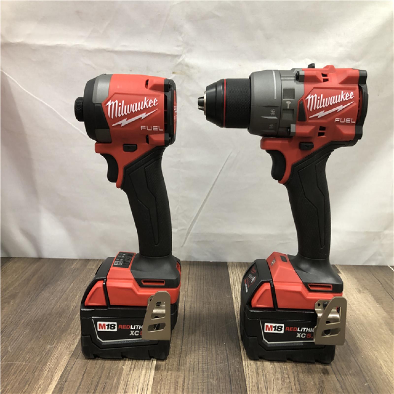 AS-IS Milwaukee FUEL 18V Lithium-Ion Brushless Cordless Hammer Drill and Impact Driver Combo Kit