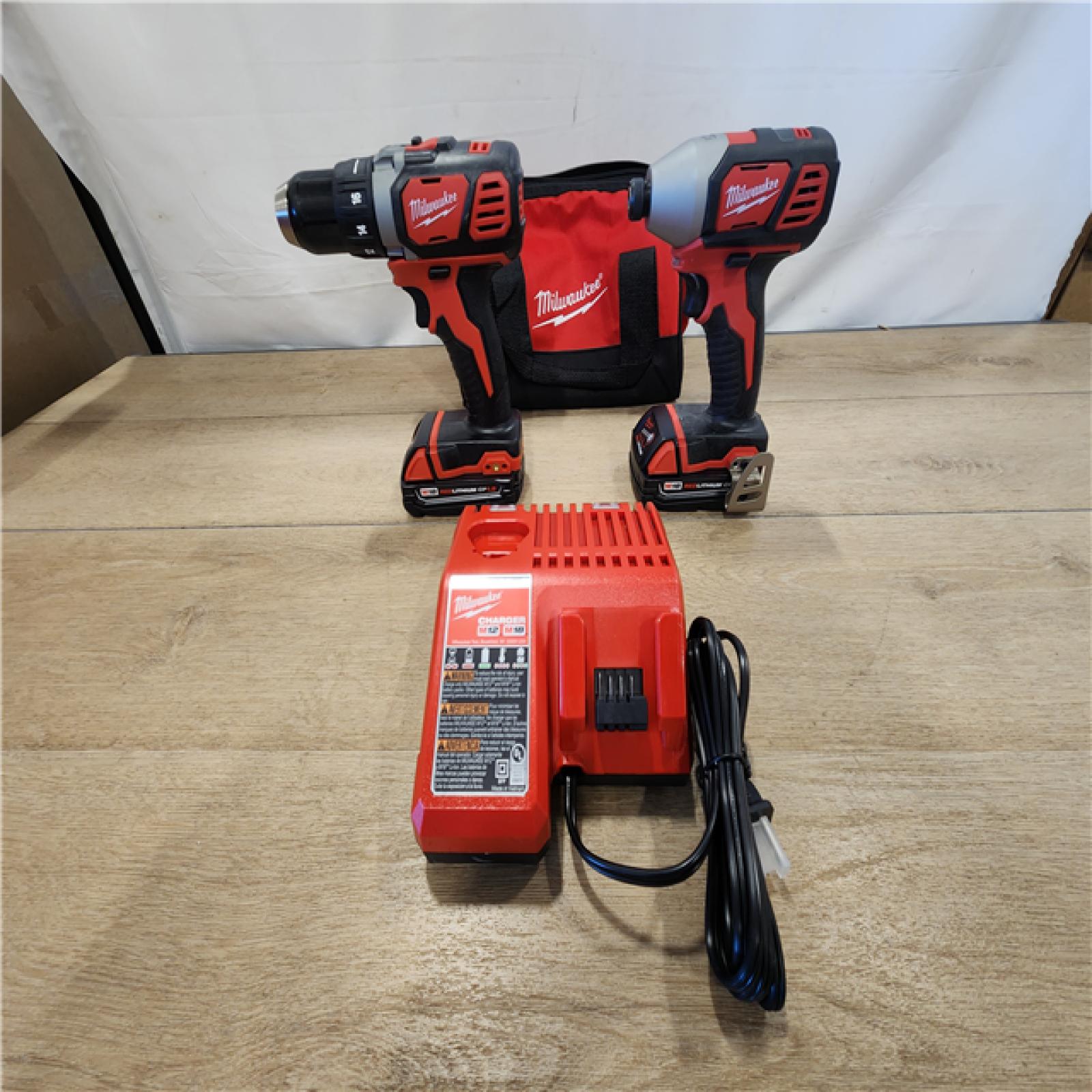 AS-IS- Milwaukee  18V Lithium-Ion Cordless Drill Driver/Impact Driver Combo Kit