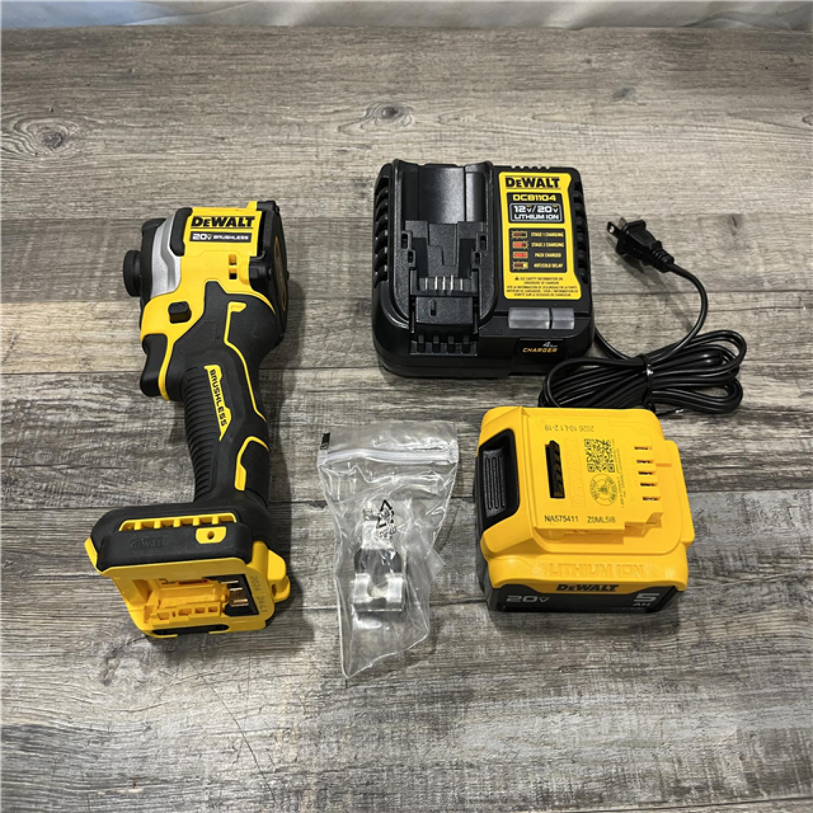 AS-IS DEWALT ATOMIC 20V MAX Lithium-Ion Cordless 1/4 in. Brushless Impact Driver Kit