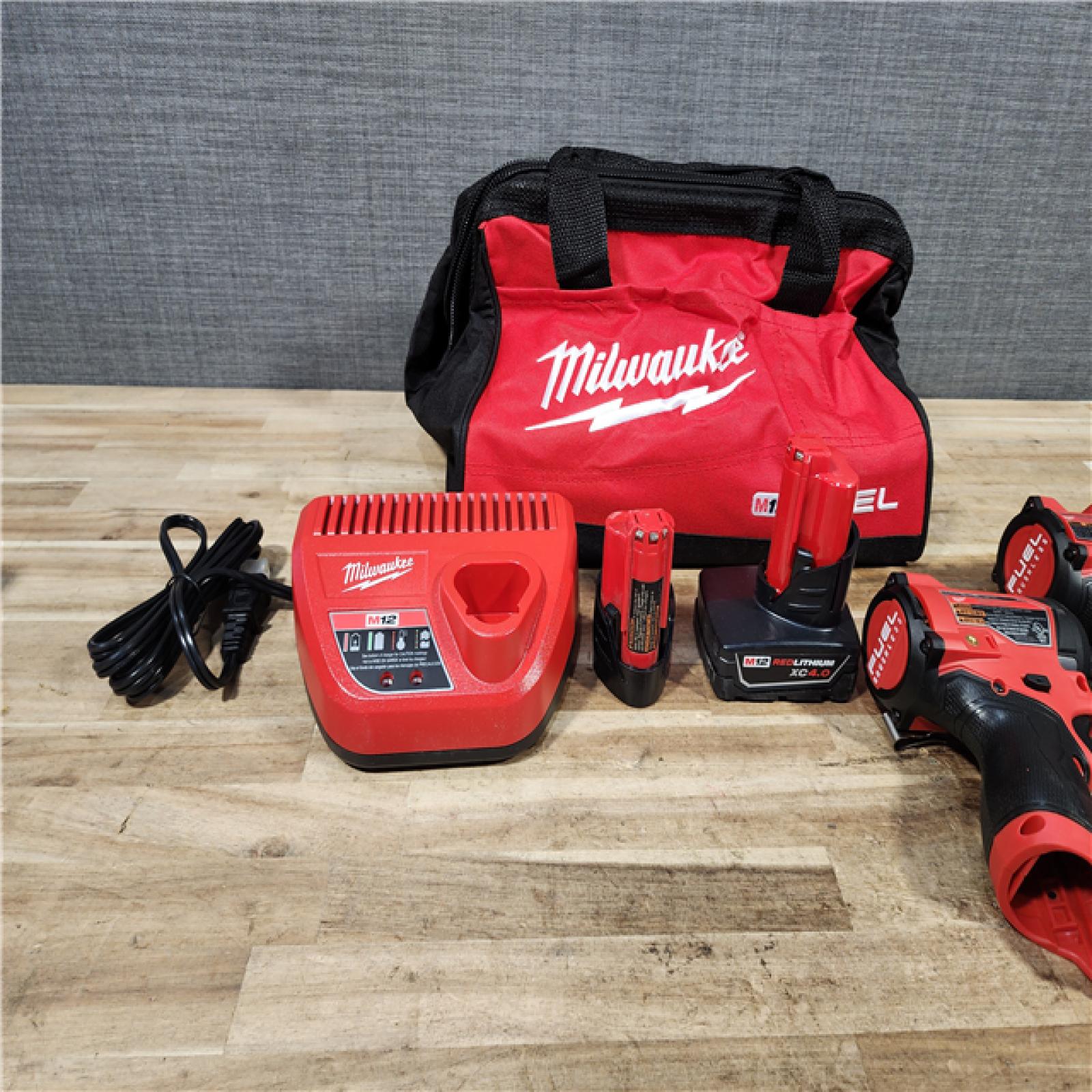 HOUSTON LOCATION - AS - IS Milwaukee FUEL 12-Volt Lithium-Ion Brushless Cordless Hammer Drill and Impact Driver Combo Kit