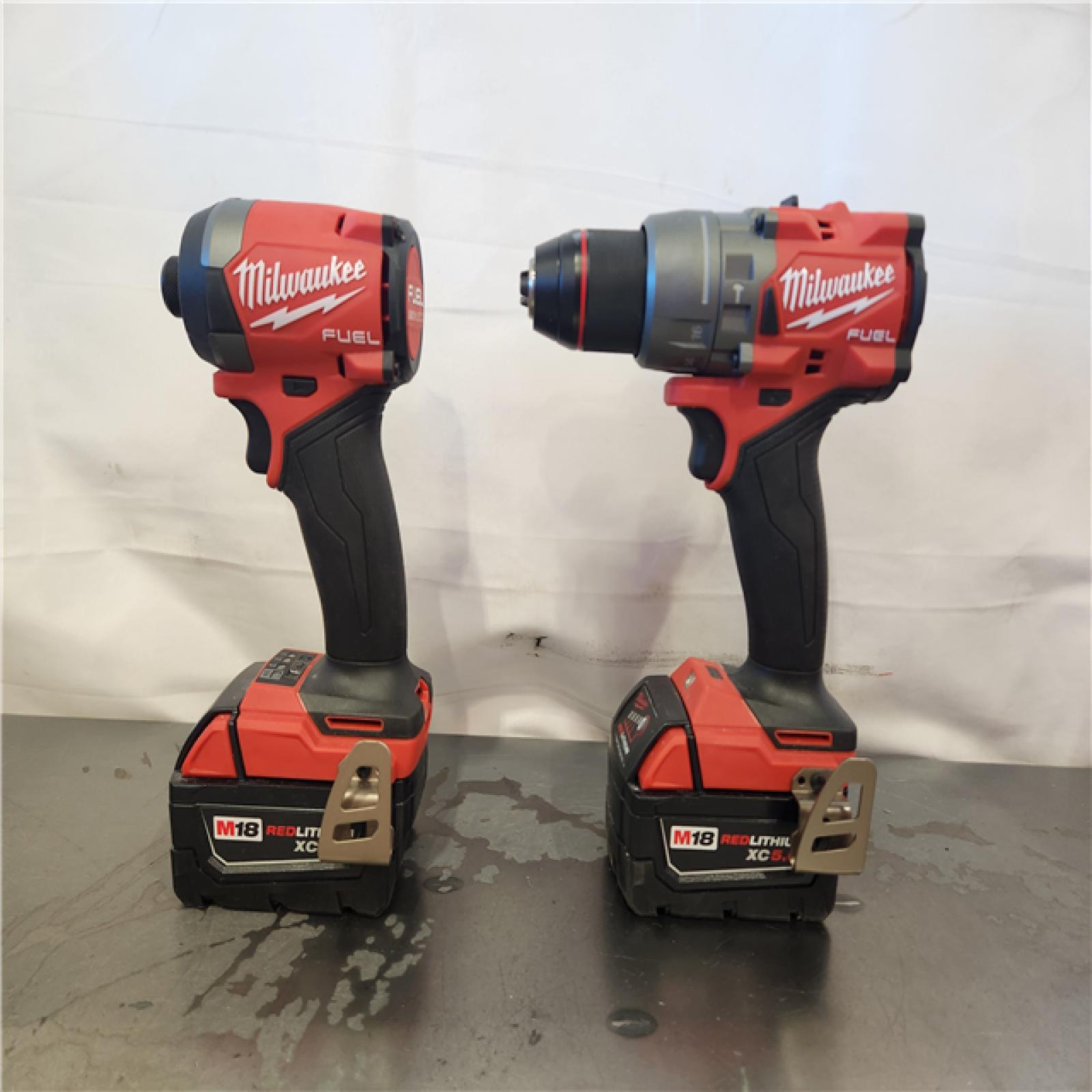 AS-IS- Milwaukee FUEL 18V Lithium-Ion Brushless Cordless Hammer Drill and Impact Driver Combo Kit