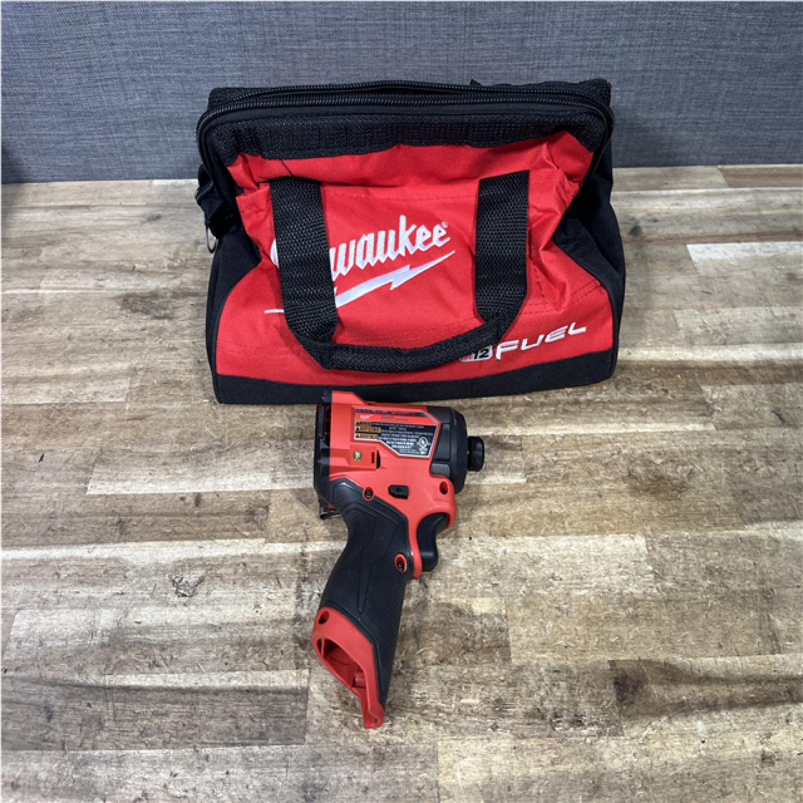 Houston Location AS-IS Milwaukee FUEL 12V Lithium-Ion Brushless Cordless 1/4 in. Hex Impact Driver (Tool-Only)