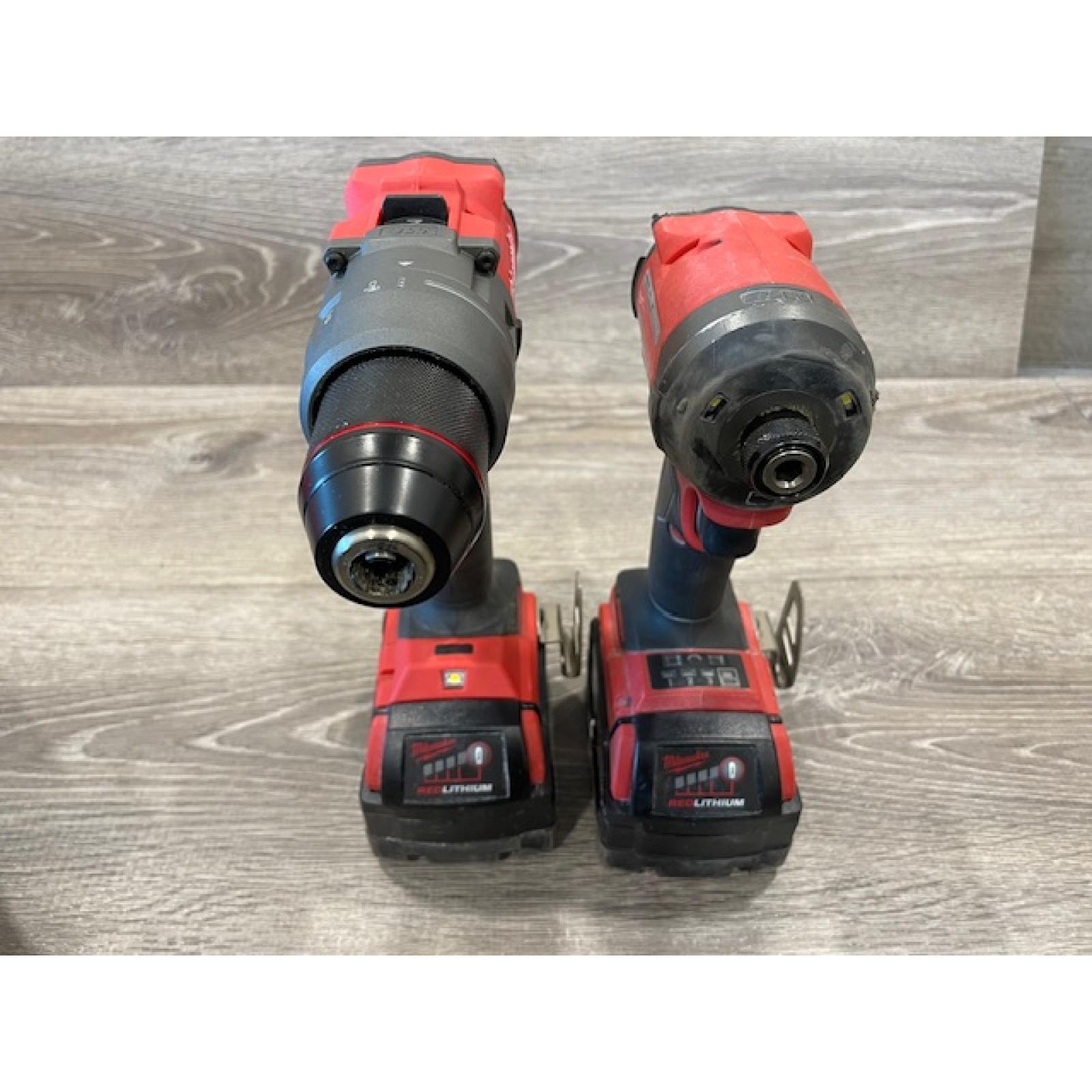 AS-IS Milwaukee FUEL 18V Lithium-Ion Brushless Cordless Hammer Drill and Impact Driver Combo Kit