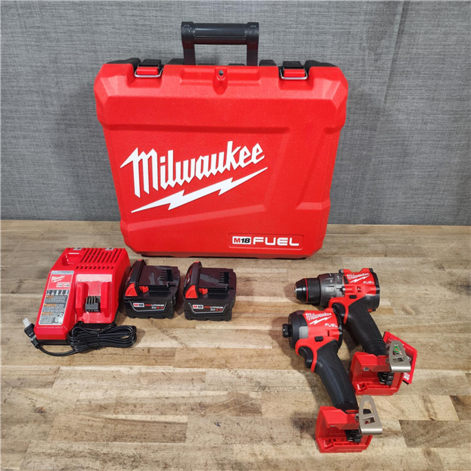 HOUSTON LOCATION - AS-IS (APPEARS LIKE NEW) Milwaukee FUEL 18V Lithium-Ion Brushless Cordless Hammer Drill and Impact Driver Combo Kit
