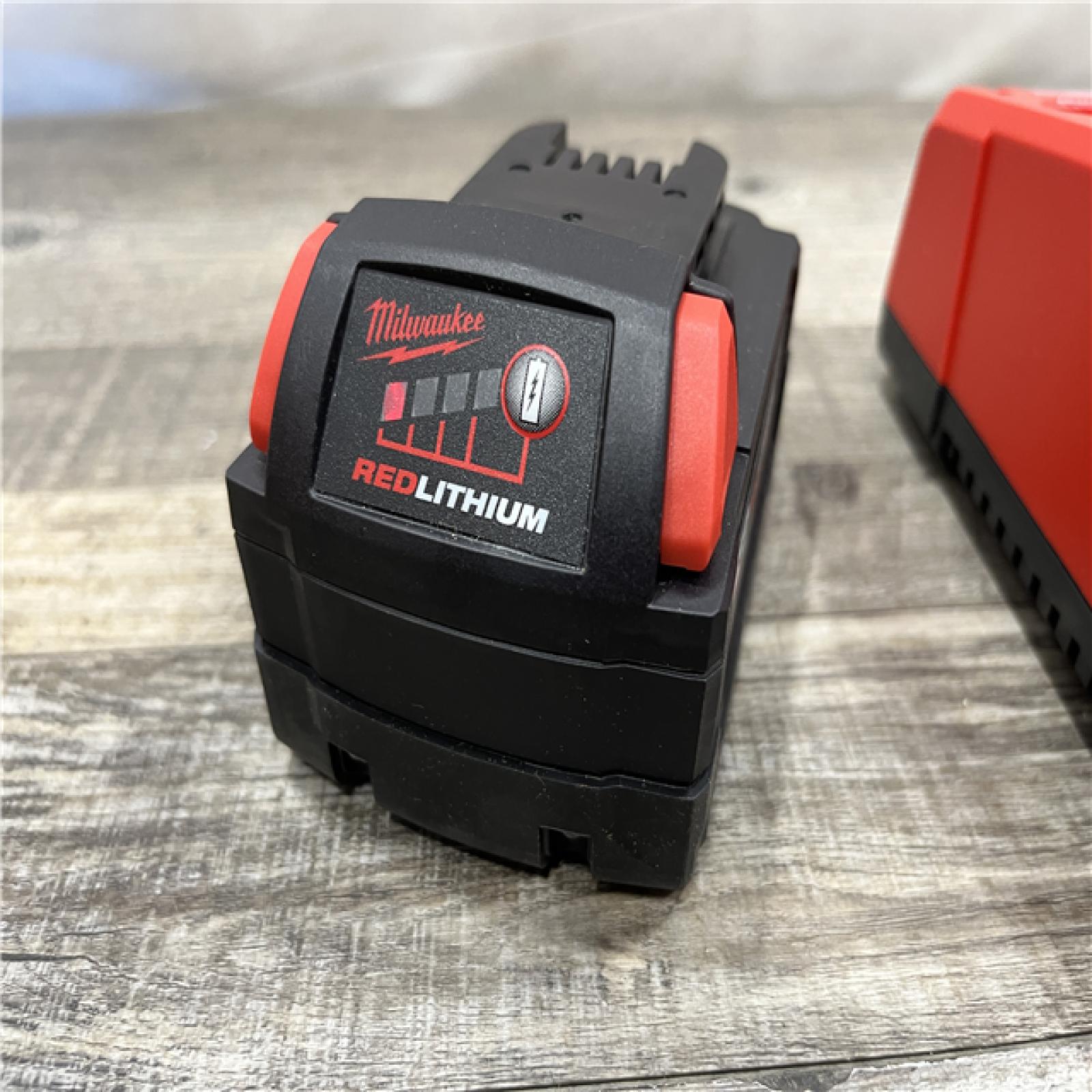 AS-IS Milwaukee 18-Volt Lithium-Ion XC Starter Kit with One 5.0Ah Battery and Charger