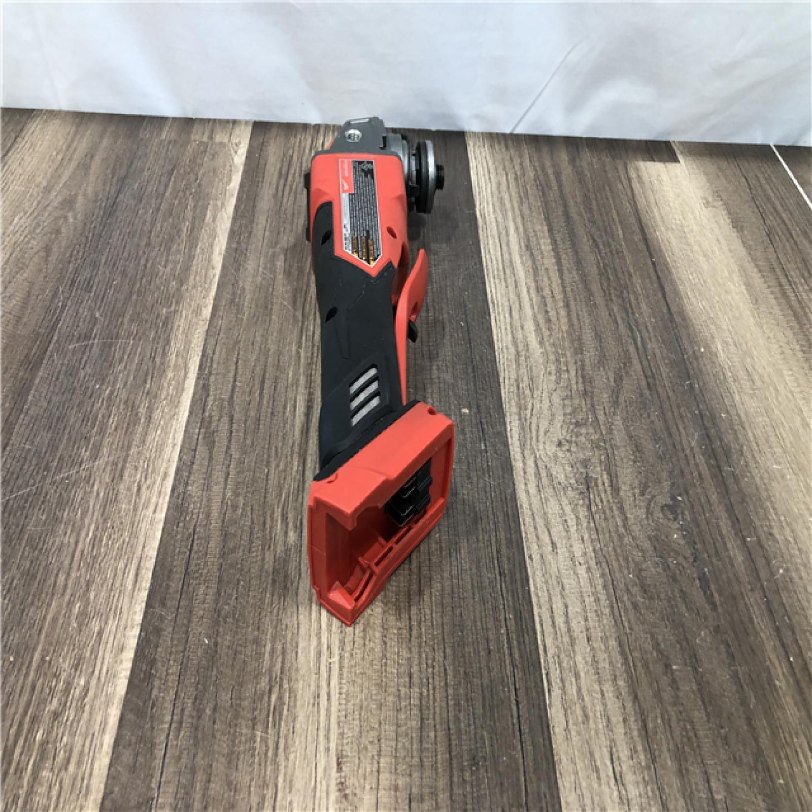 AS-IS Milwaukee FUEL 18V Lithium-Ion Brushless Cordless 4-1/2 in./5 in. Grinder w/Paddle Switch (Tool-Only)