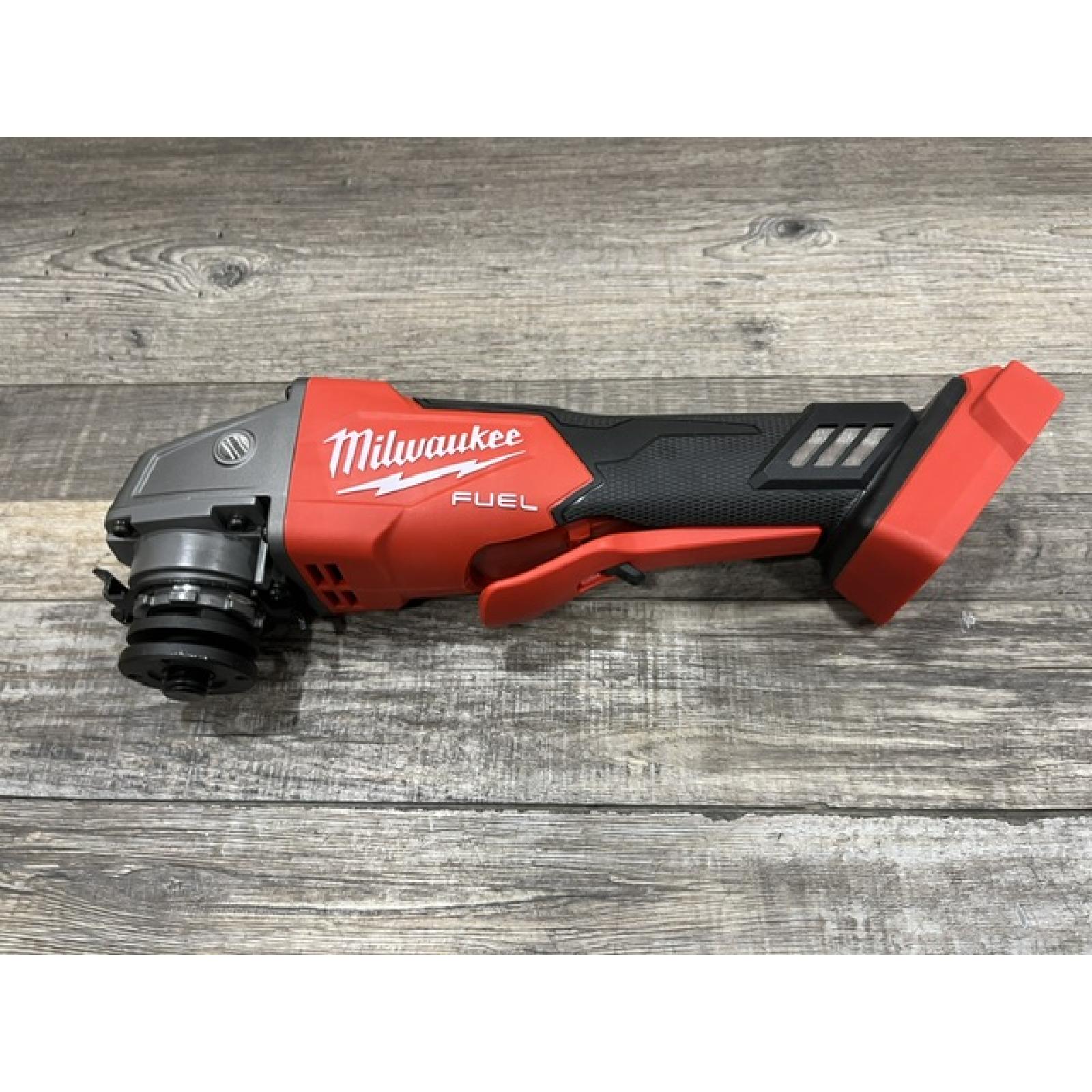 AS-IS Milwaukee FUEL 18V Lithium-Ion Brushless Cordless 4-1/2 in./5 in. Grinder w/Paddle Switch (Tool-Only)