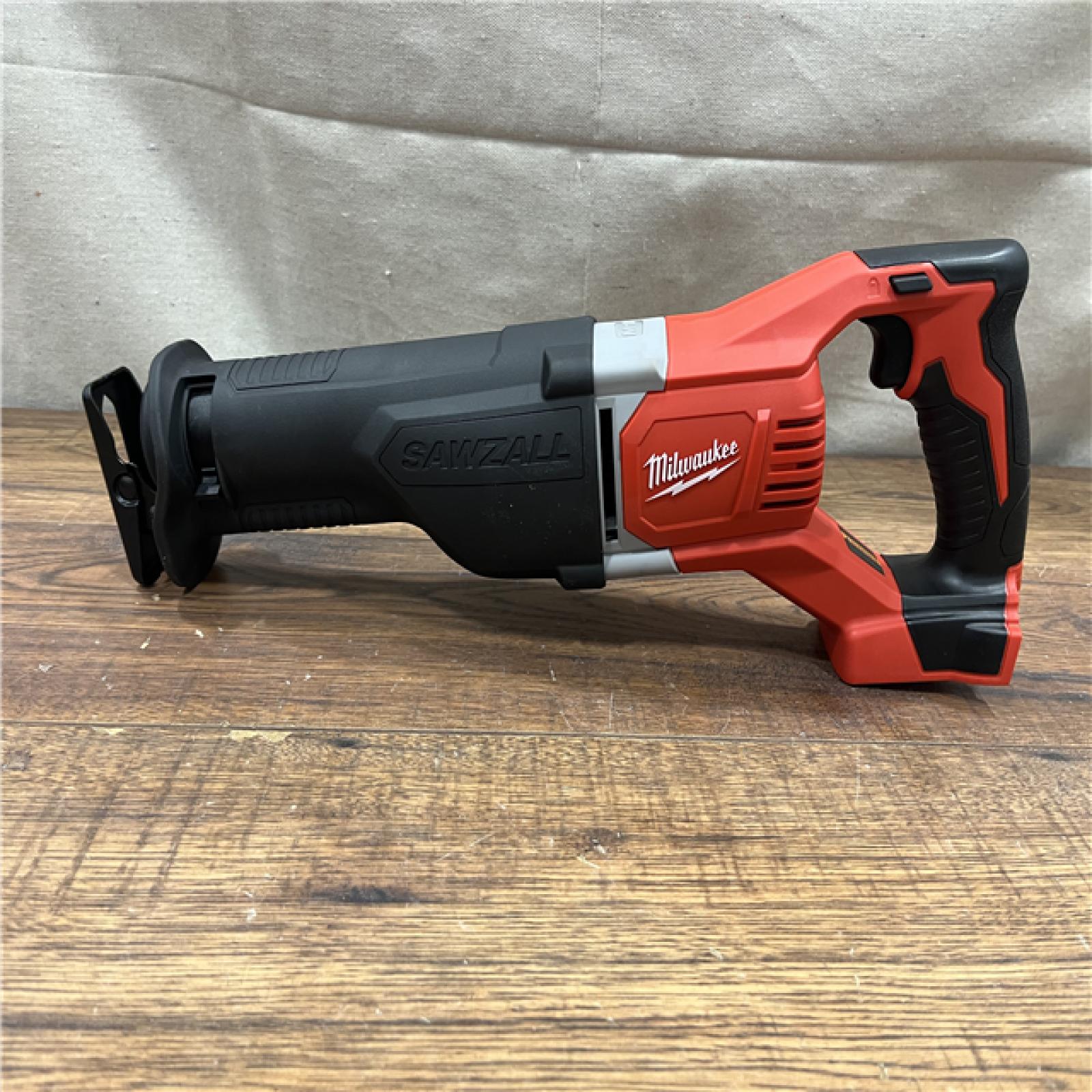 AS-IS MILWAUKEE M18 18V Lithium-Ion Cordless Combo Tool Kit with Two 3.0Ah Batteries, 1-Charger, 1-Tool Bag (4-Tool)