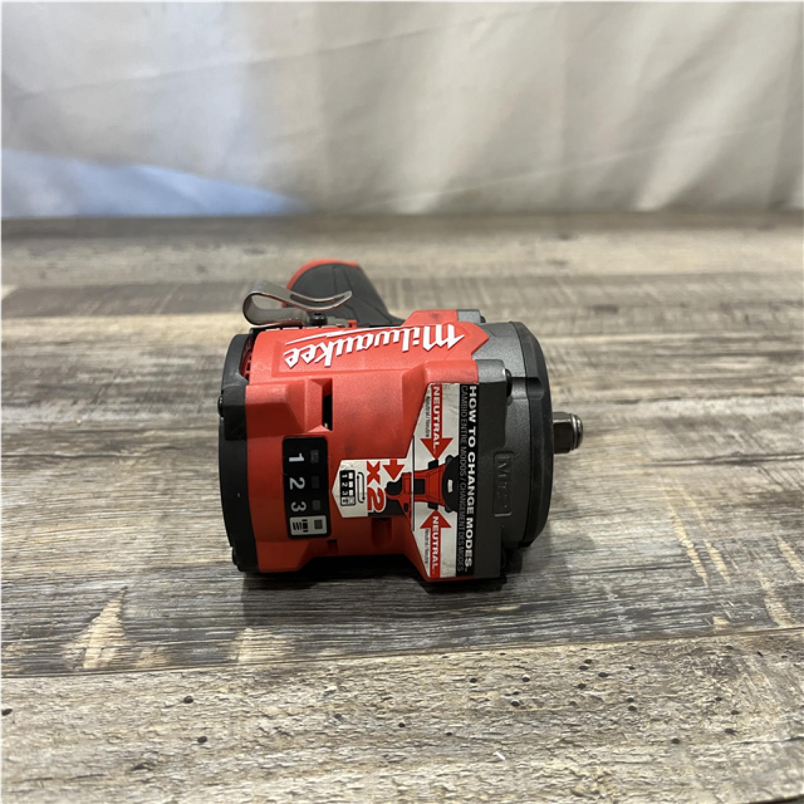 AS-IS Milwaukee FUEL 12V Li-Ion Brushless Cordless Stubby 3/8 in. Impact Wrench Kit