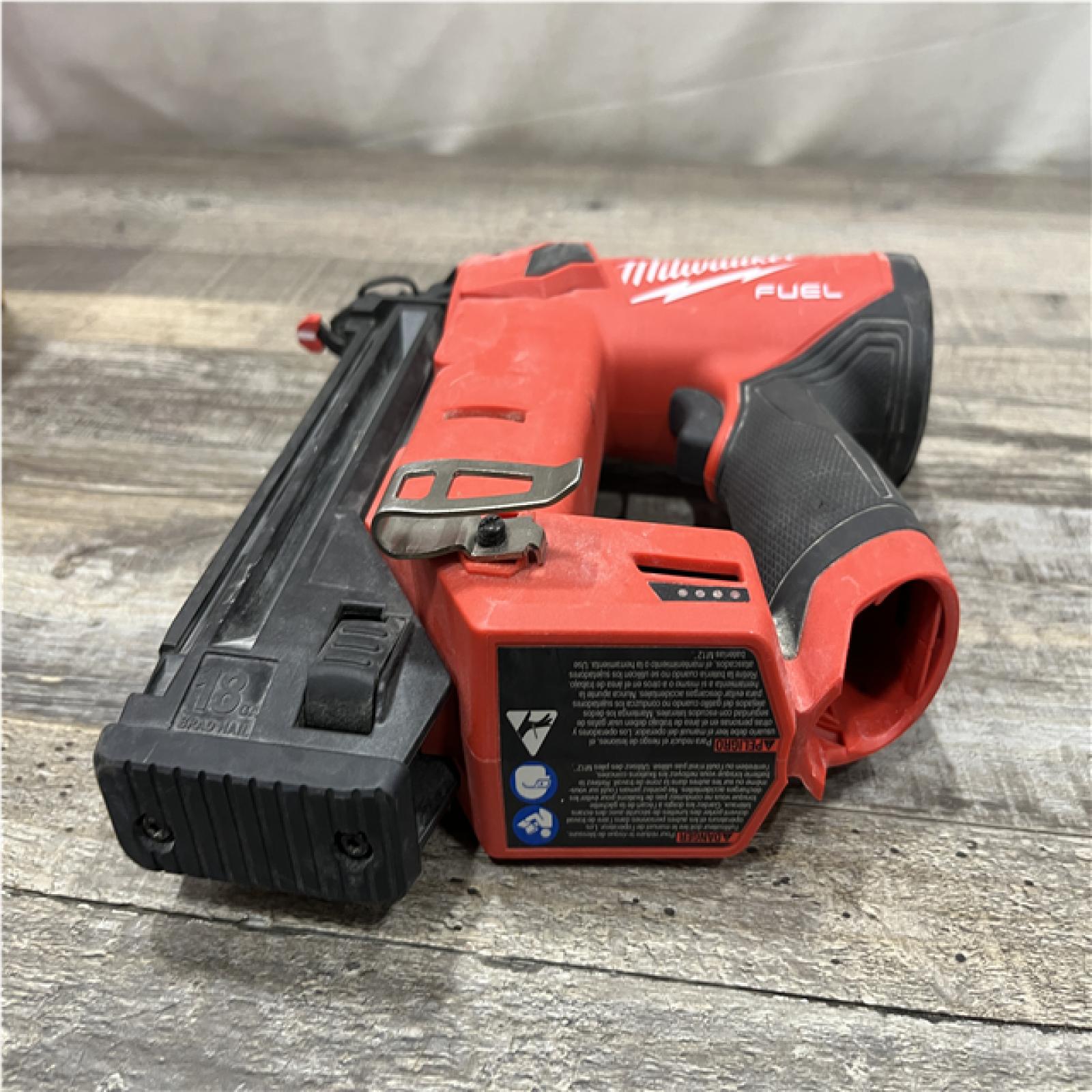 AS-IS Milwaukee FUEL 12-Volt Lithium-Ion Brushless Cordless 18-Gauge 1-1/2 in. Compact Brad Nailer (Tool Only)