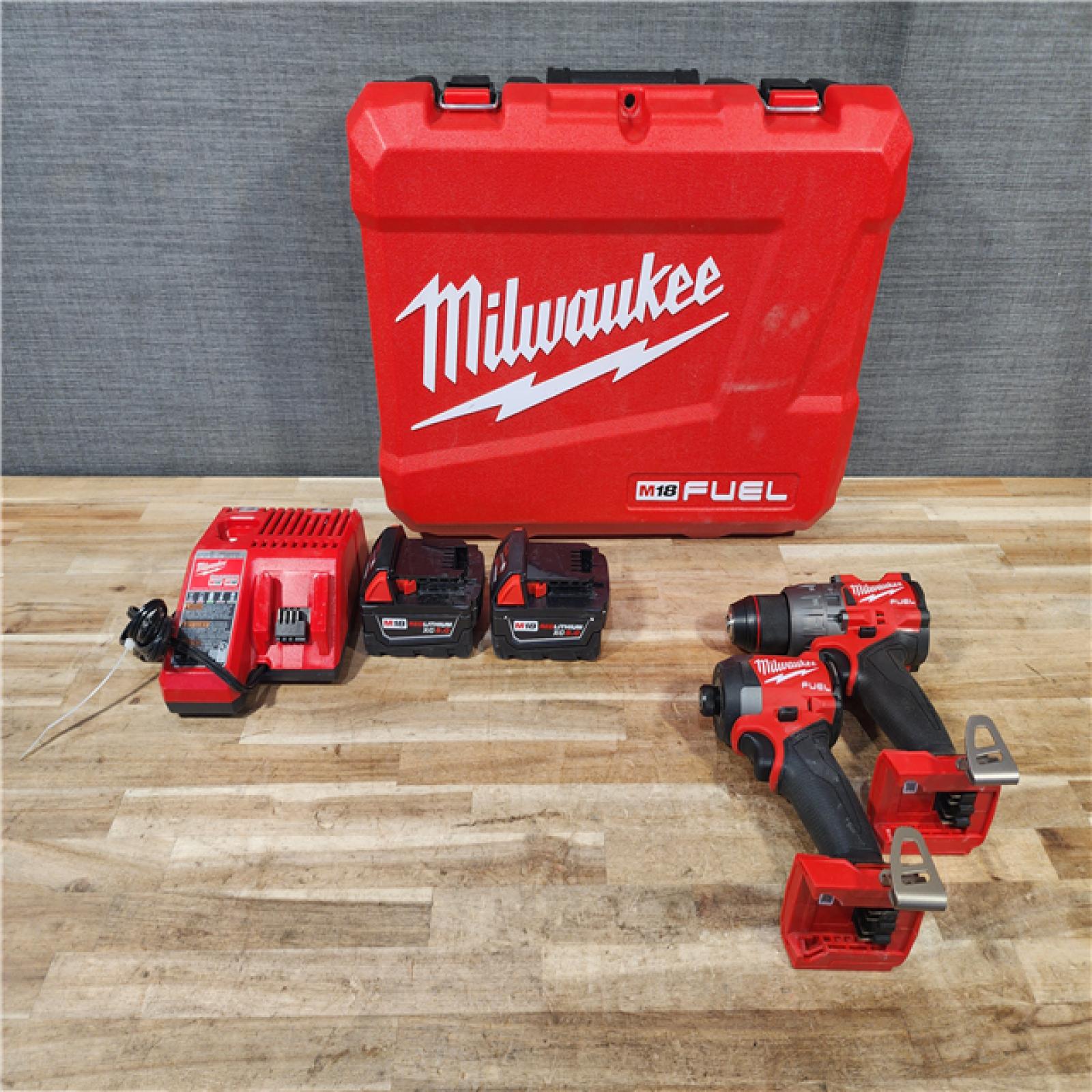 HOUSTON LOCATION - AS-IS Milwaukee FUEL 18V Lithium-Ion Brushless Cordless Hammer Drill and Impact Driver Combo Kit