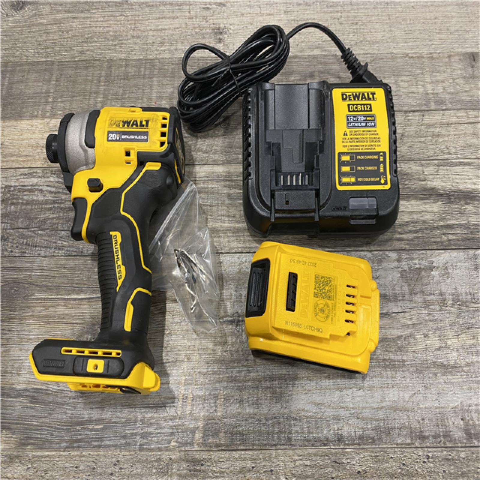 AS-IS DEWALT Atomic 20V Max Lithium-Ion Brushless Cordless Compact 1/4 in. Impact Driver Kit