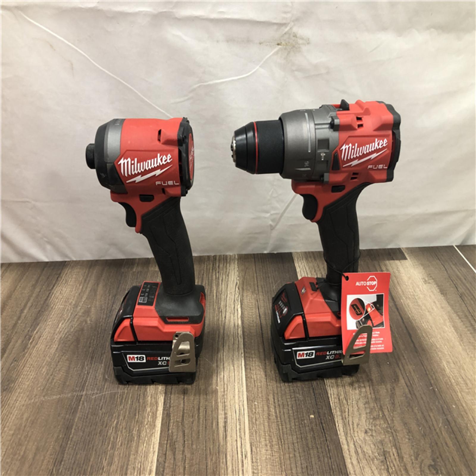 AS-IS Milwaukee  FUEL 18V Lithium-Ion Brushless Cordless Hammer Drill and Impact Driver Combo Kit