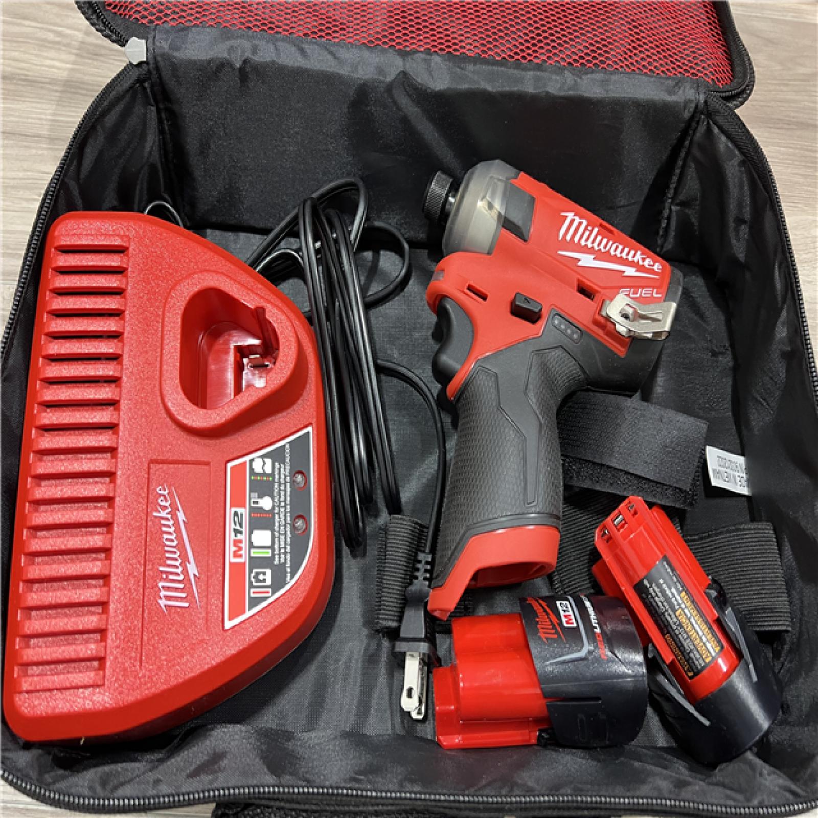 AS-IS Milwaukee FUEL SURGE 12V Lithium-Ion Brushless Cordless 1/4 in. Hex Impact Driver Compact Kit