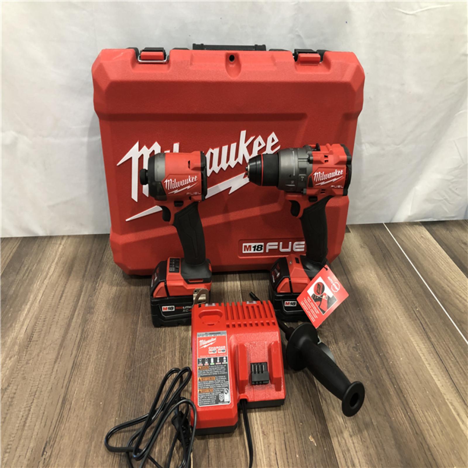 AS-IS Milwaukee  FUEL 18V Lithium-Ion Brushless Cordless Hammer Drill and Impact Driver Combo Kit