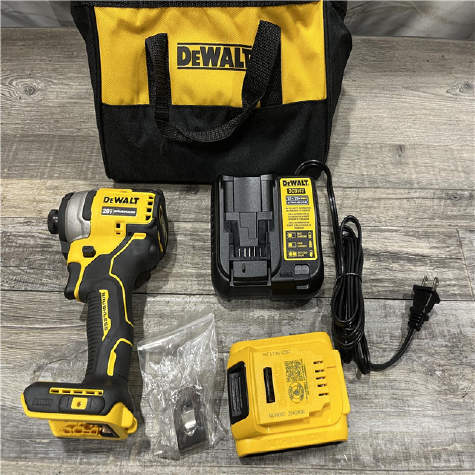 AS-IS DEWALT Atomic 20V Max Lithium-Ion Brushless Cordless Compact 1/4 in. Impact Driver Kit