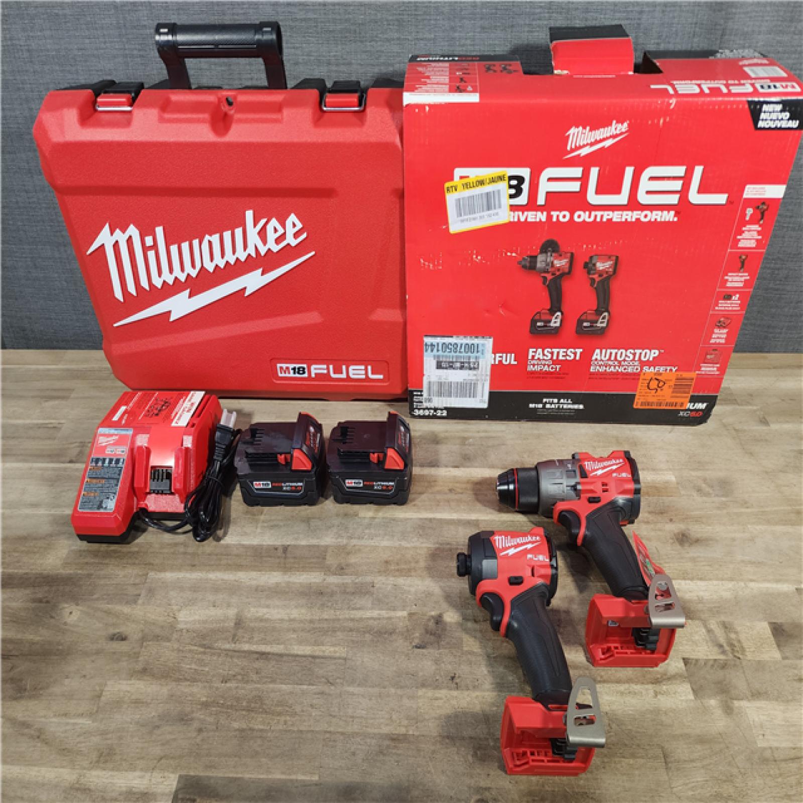HOUSTON LOCATION - AS-IS (APPEARS LIKE NEW) MILWAUKEE M18 FUEL 18V Lithium-Ion Brushless Cordless Hammer Drill and Impact Driver Combo Kit (2-Tool) with 2 Batteries