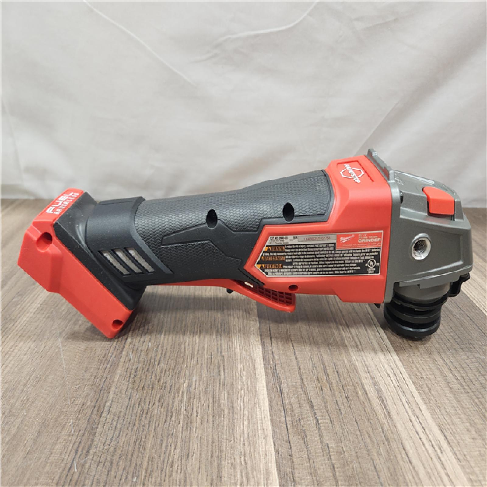 AS-IS- Milwaukee FUEL 18-Volt Lithium-Ion Brushless Cordless 4-1/2 in./5 in. Grinder W/Paddle Switch (Tool-Only)