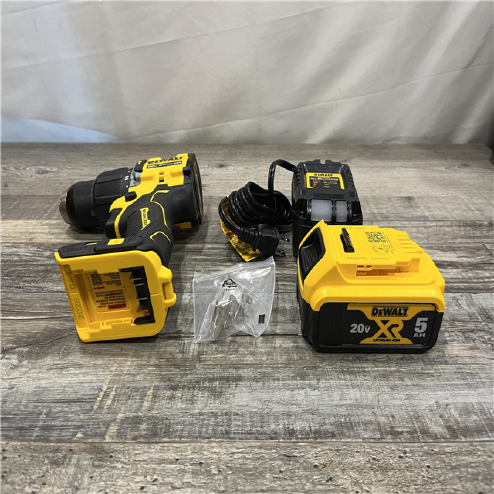 AS-IS DEWALT ATOMIC 20V Lithium-Ion Cordless 1/2 in. Hammer Drill Kit