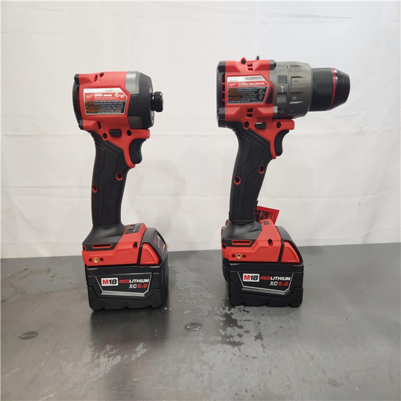 AS-IS- Milwaukee FUEL 18V Lithium-Ion Brushless Cordless Hammer Drill and Impact Driver Combo Kit
