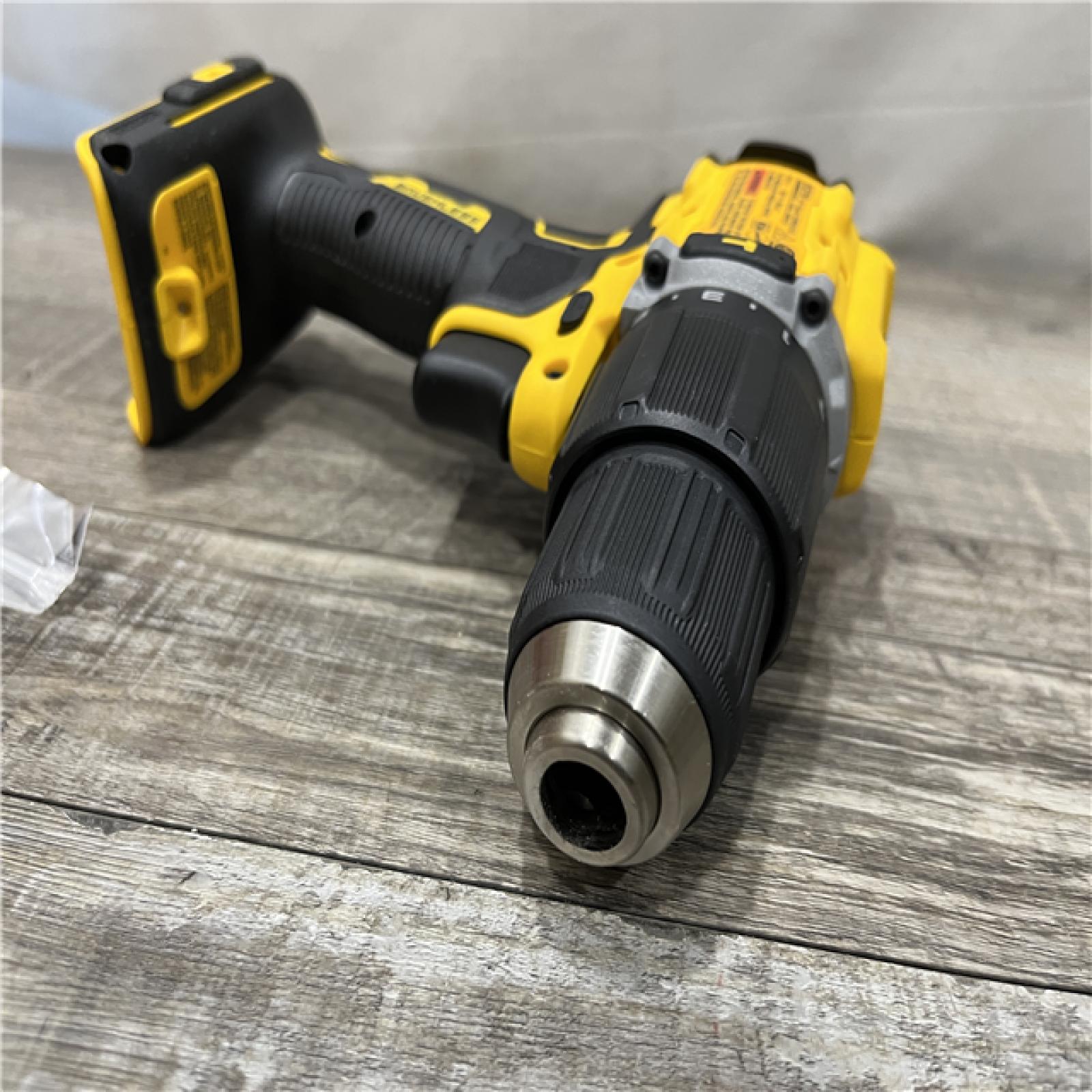 AS-IS DEWALT ATOMIC 20-Volt MAX Brushless Cordless 1/2 in. Hammer Drill (Tool-Only)