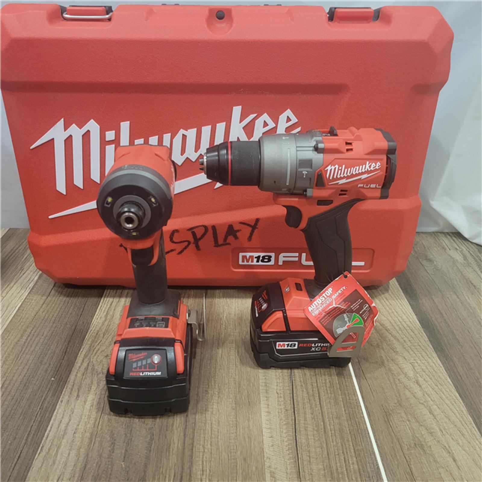 AS-IS MILWAUKEE M18 FUEL 18V Lithium-Ion Brushless Cordless Hammer Drill and Impact Driver Combo Kit (2-Tool) with 2 Batteries