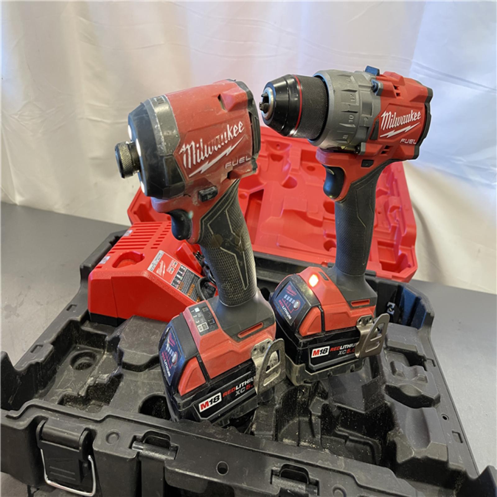 AS-IS - Milwaukee M18 FUEL 18V Lithium-Ion Brushless Cordless Hammer Drill and Impact Driver Combo Kit