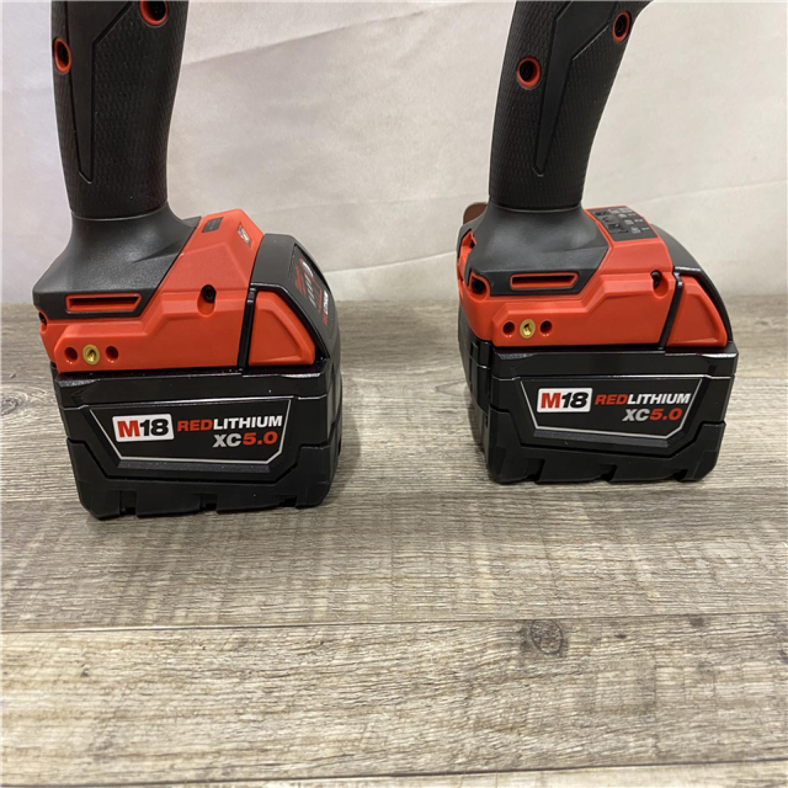 AS-IS Milwaukee FUEL 18V Lithium-Ion Brushless Cordless Hammer Drill and Impact Driver Combo Kit