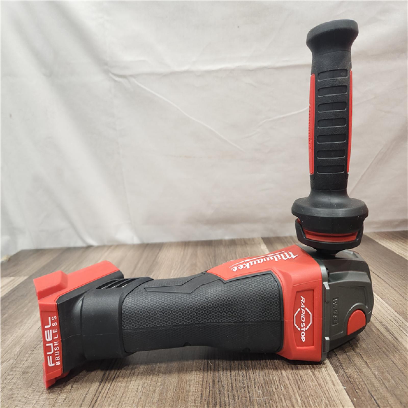 Milwaukee FUEL 18-Volt Lithium-Ion Brushless Cordless 4-1/2 in./5 in. Grinder W/Paddle Switch (Tool-Only)