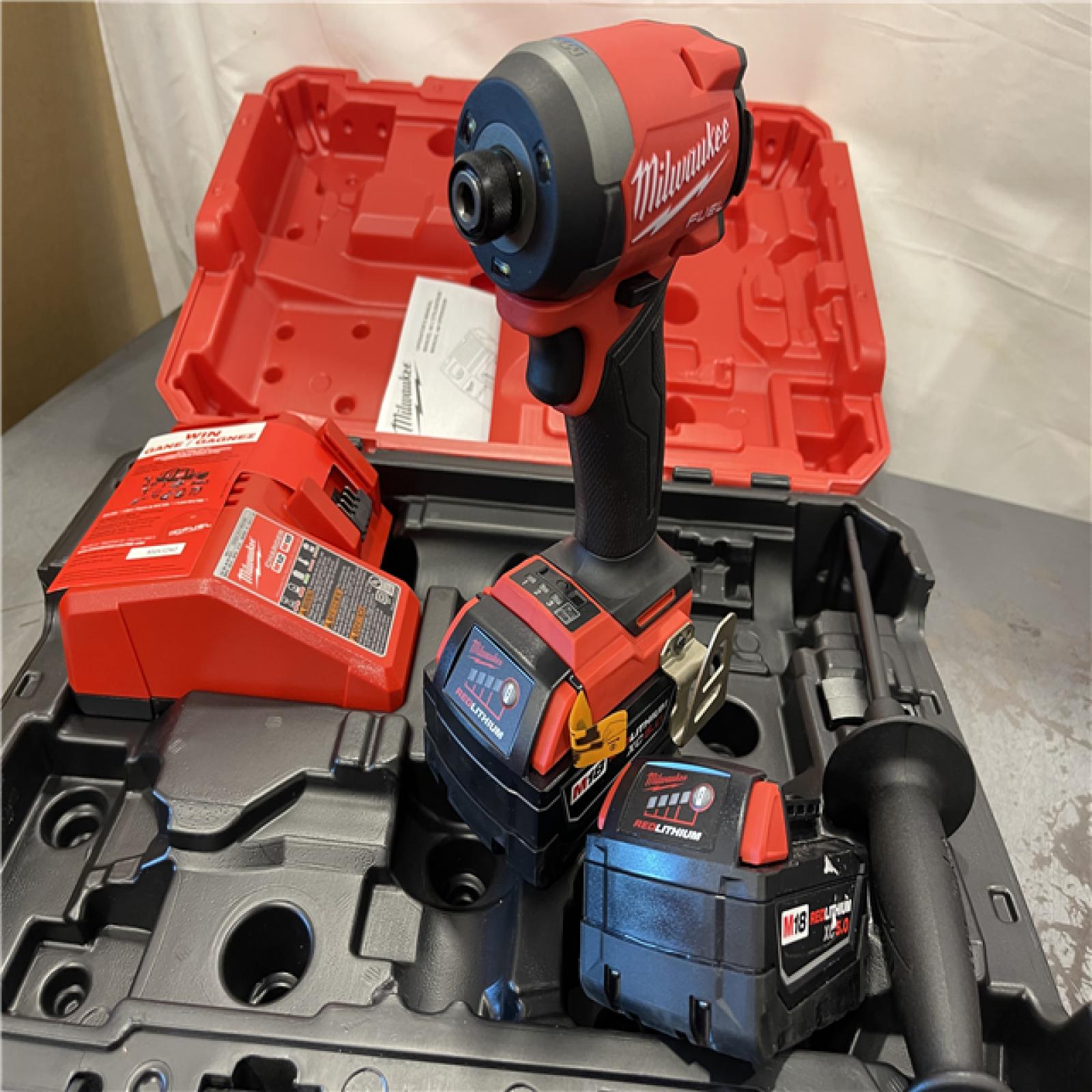 AS-IS - Milwaukee M18 FUEL 18-Volt Lithium Ion Brushless Cordless 1/4 in. Hex Impact Driver Kit