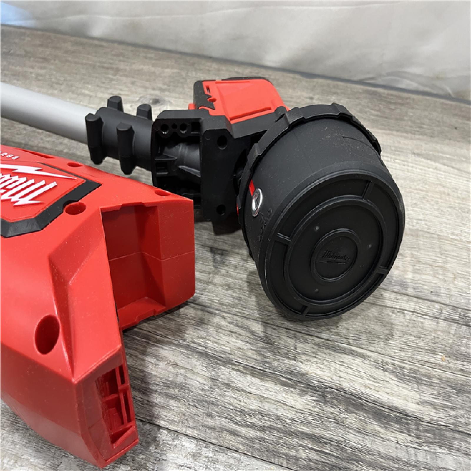 AS-IS Milwaukee Brushless 18V 16 in. Cordless Battery Powered String Trimmer Kit