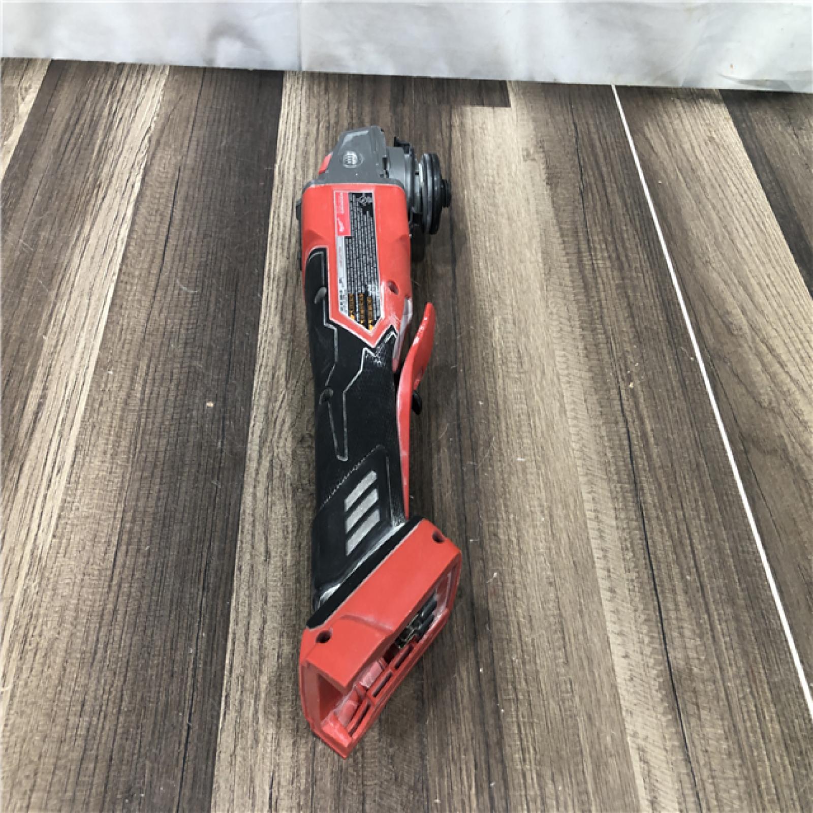 AS-IS Milwaukee  FUEL 18V Lithium-Ion Brushless Cordless 4-1/2 in./5 in. Grinder w/Paddle Switch (Tool-Only)