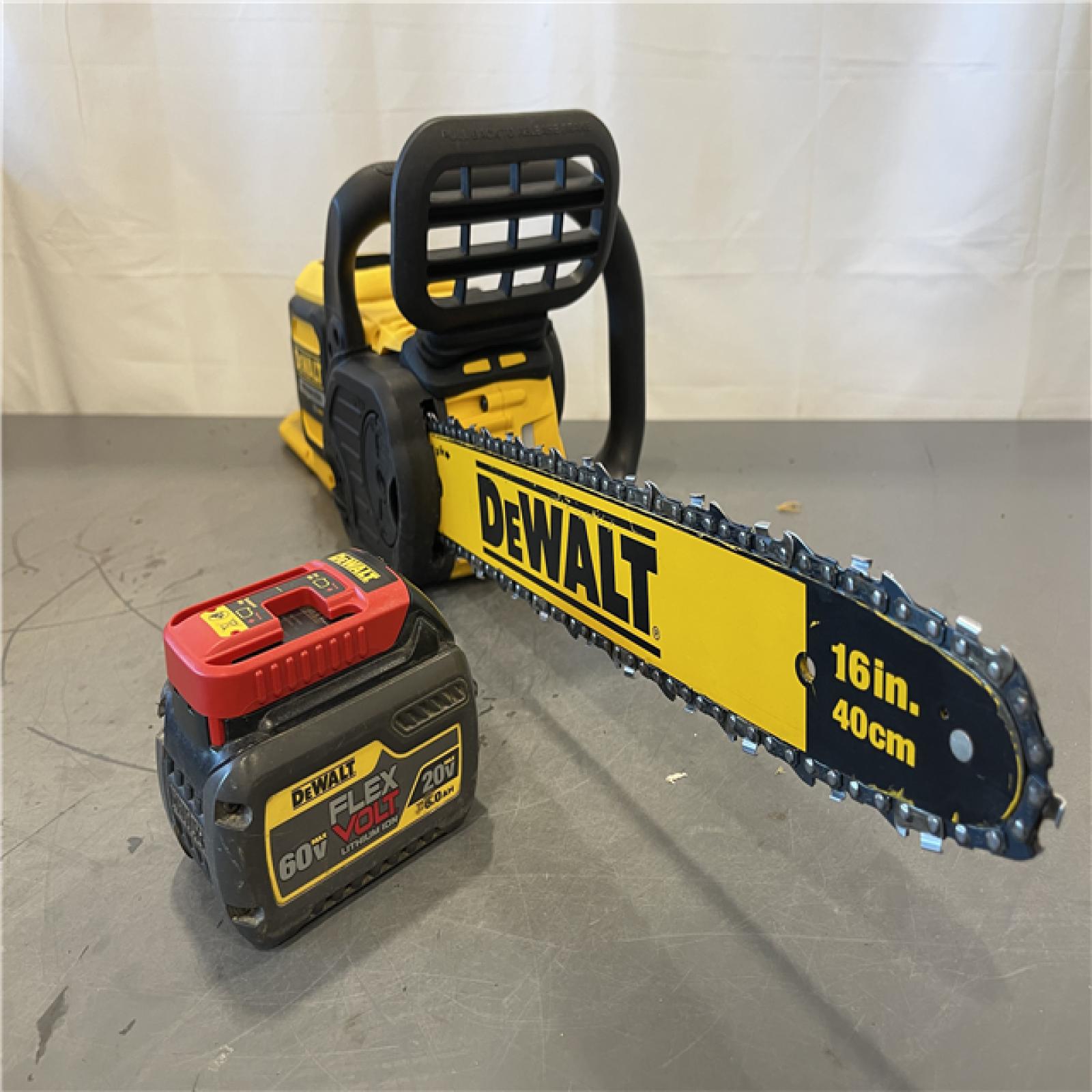 AS-IS - DEWALT FLEXVOLT 60V MAX 16in. Brushless Cordless Battery Powered Chainsaw Kit
