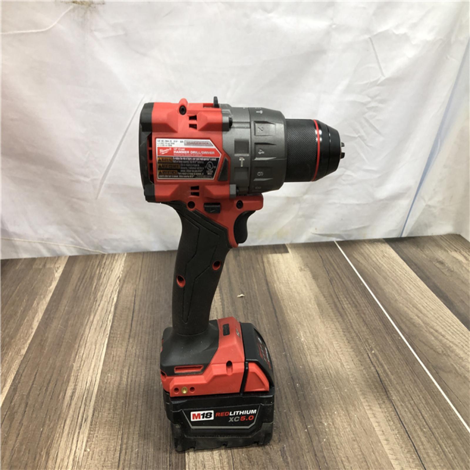 AS-IS Milwaukee FUEL 18V Lithium-Ion Brushless Cordless 1/2 in. Hammer Drill Driver Kit