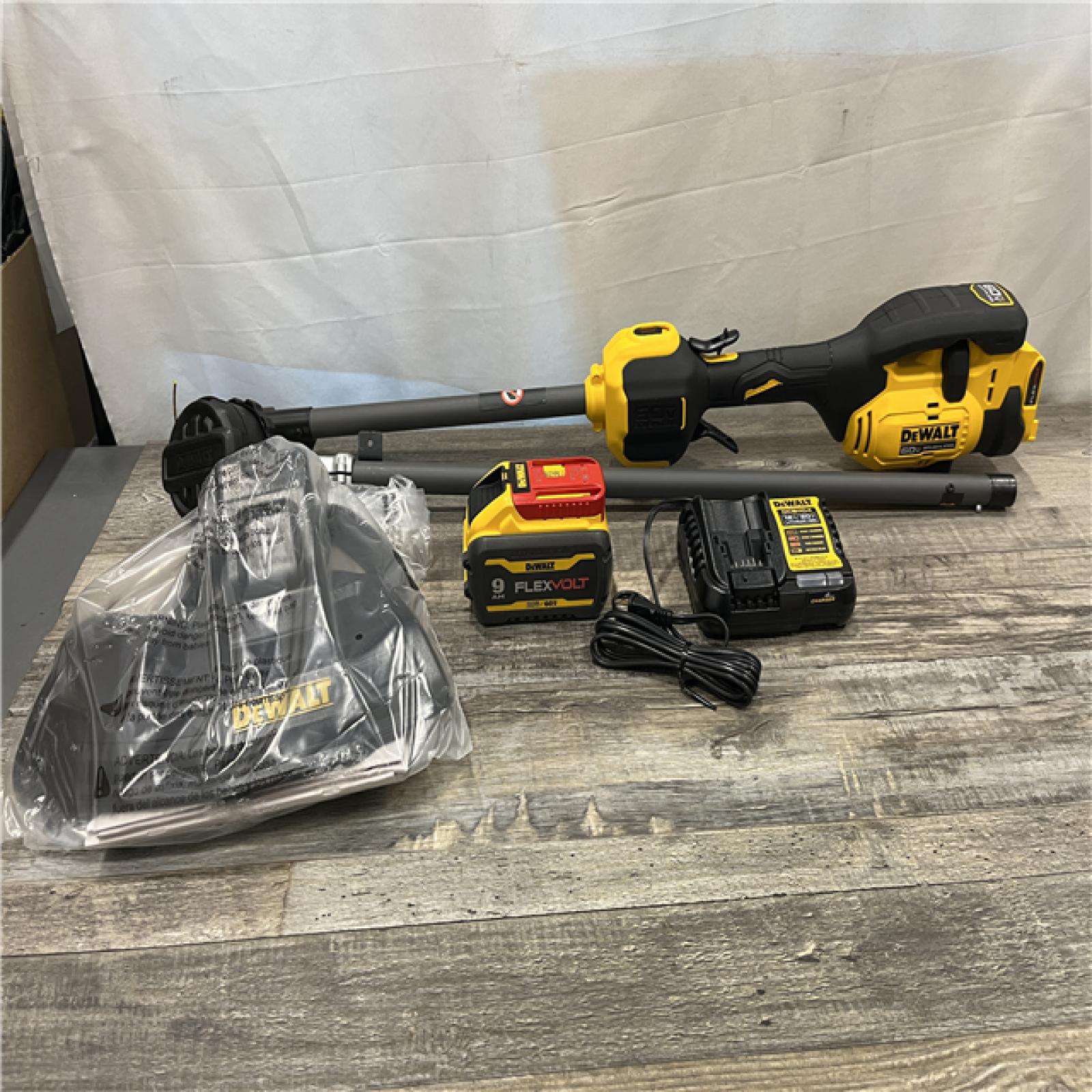 AS-IS DEWALT FLEXVOLT 60V MAX 17 in. Cordless Battery Powered Attachment Capable Trimmer Kit