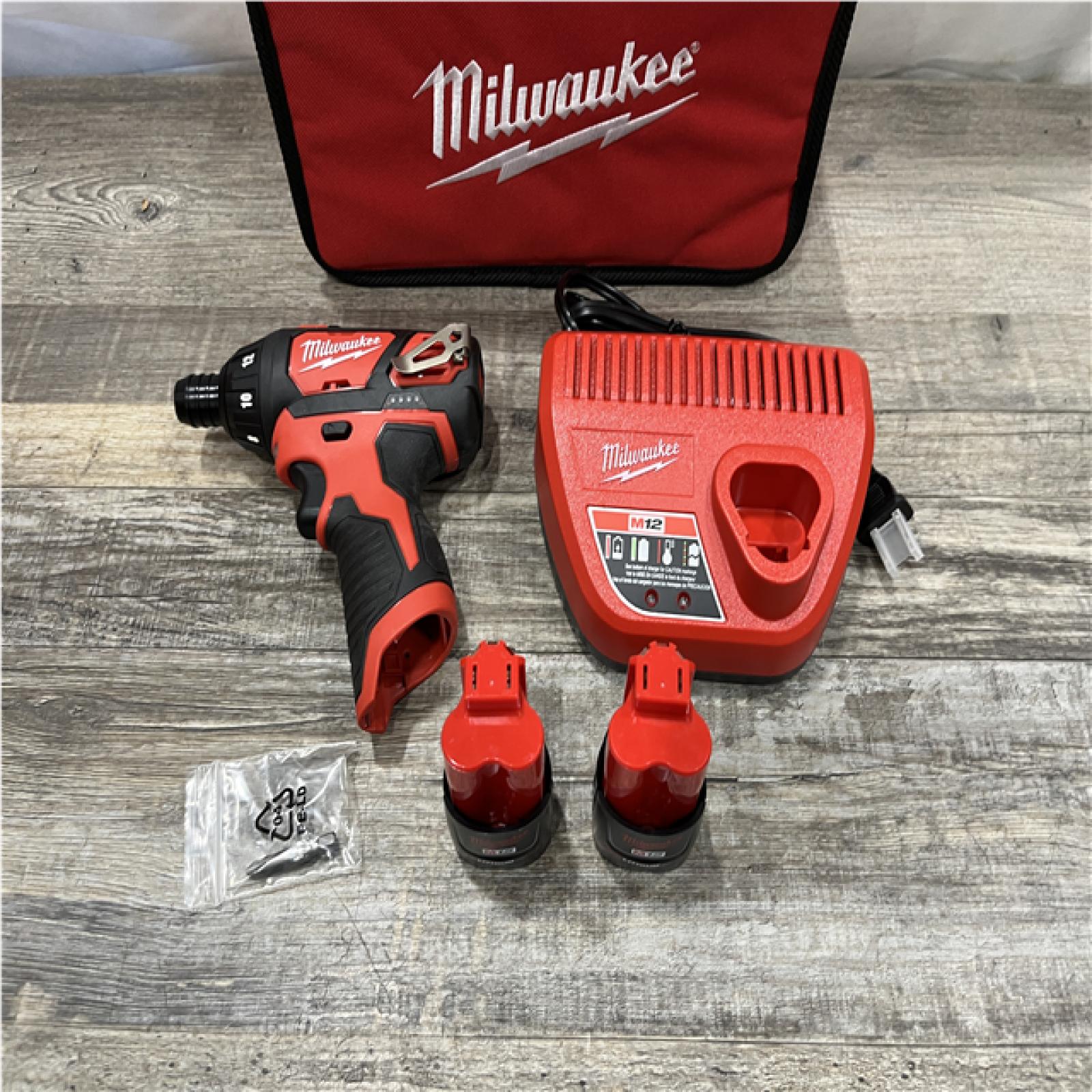 AS-IS Milwaukee 12V Lithium-Ion Cordless 1/4 in. Hex Screwdriver Kit