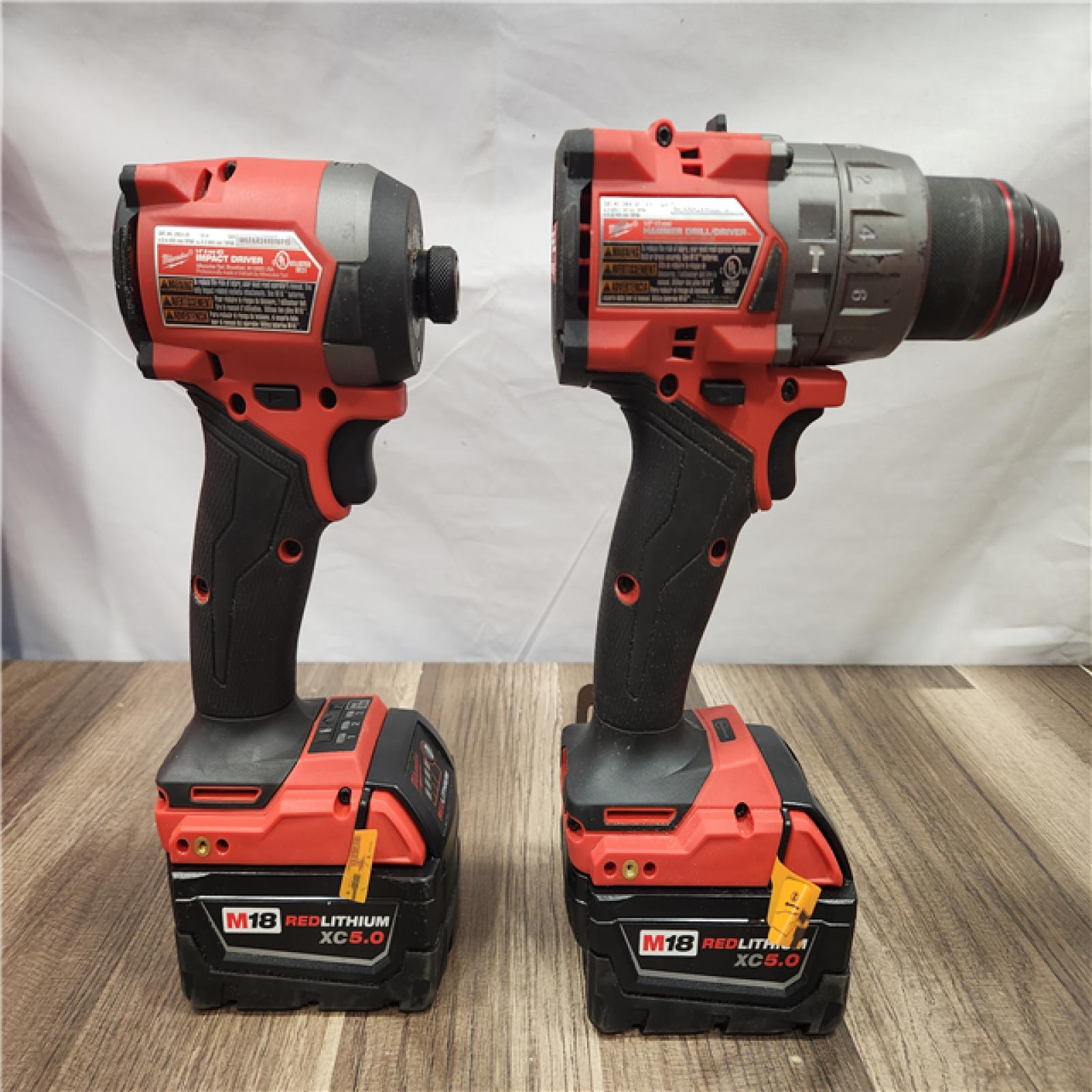 AS-IS- MILWAUKEE FUEL 18V Lithium-Ion Brushless Cordless Hammer Drill and Impact Driver Combo Kit