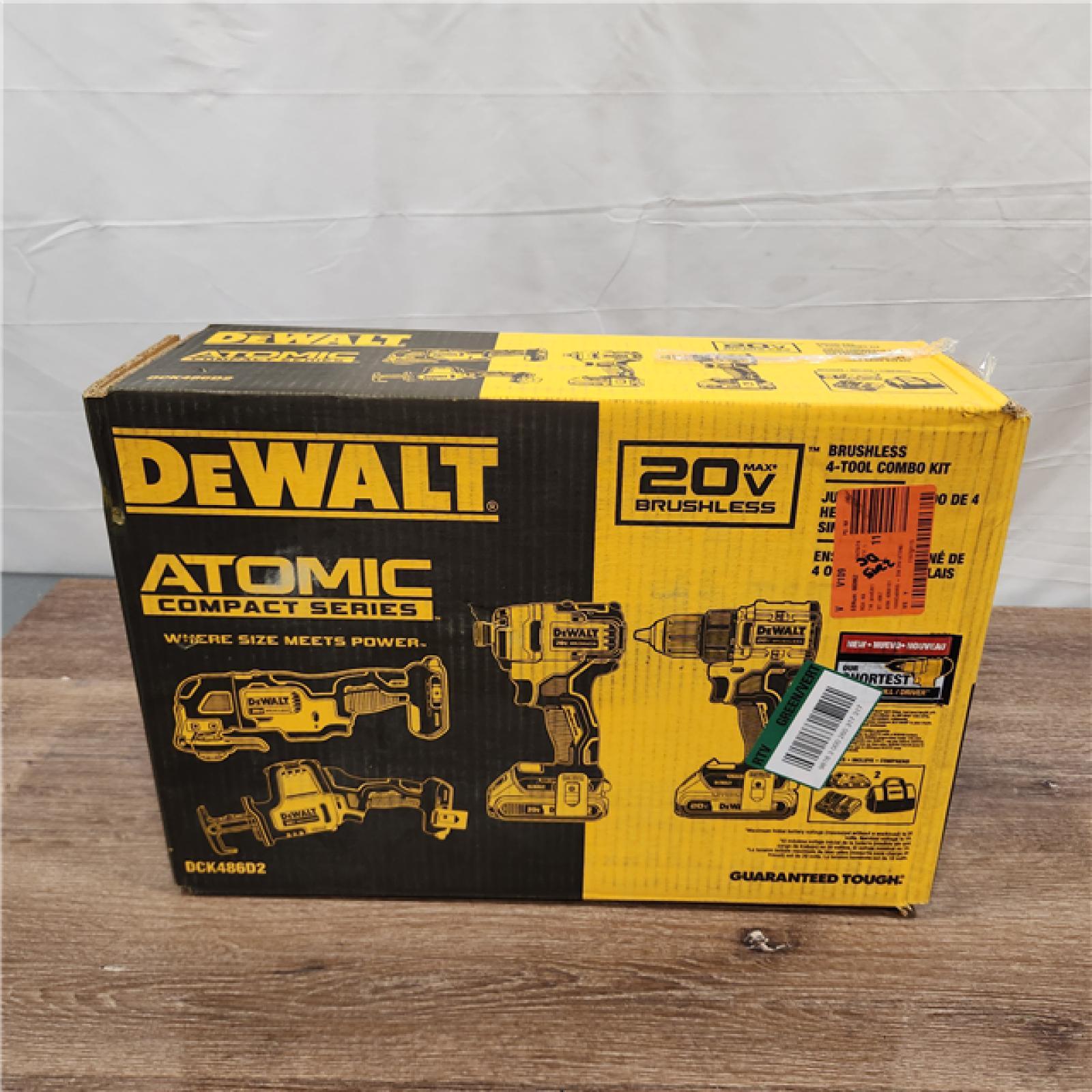 AS-IS DEWALT ATOMIC 20-Volt Lithium-Ion Cordless Brushless Combo Kit (4-Tool) with (2) 2.0Ah Batteries, Charger and Bag