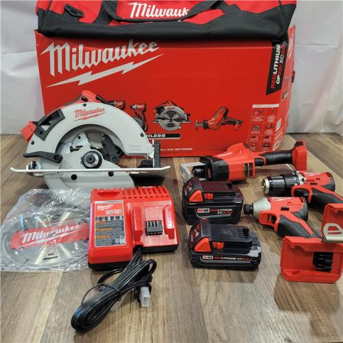 AS-IS Milwaukee M18 18-Volt Lithium-Ion Brushless Cordless Combo Kit (4-Tool) with 2-Batteries, 1-Charger and Tool Bag