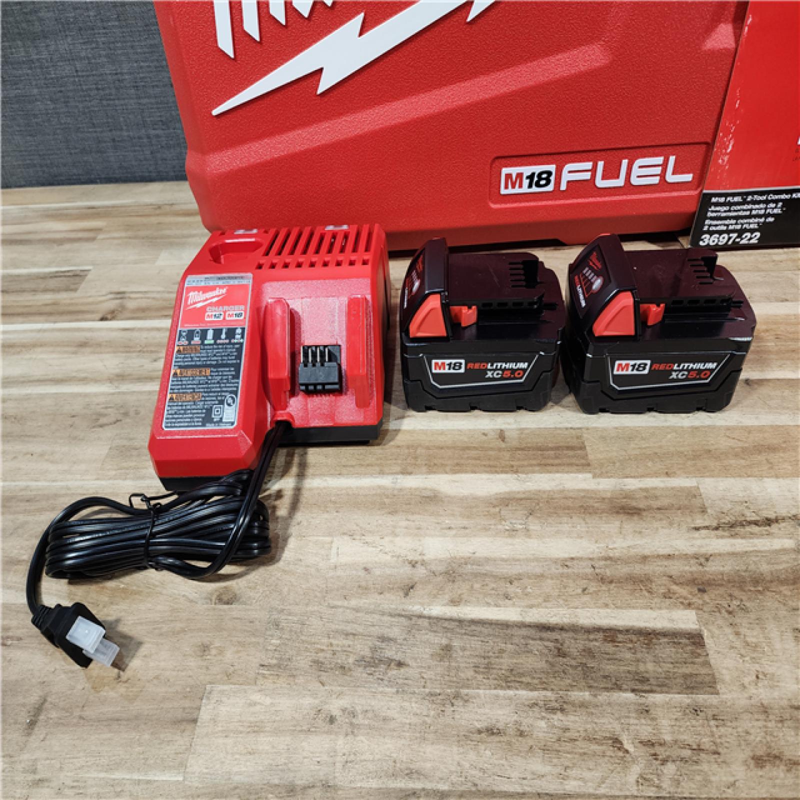 HOUSTON LOCATION - AS-IS (APPEARS LIKE NEW) Milwaukee FUEL 18V Lithium-Ion Brushless Cordless Hammer Drill and Impact Driver Combo Kit