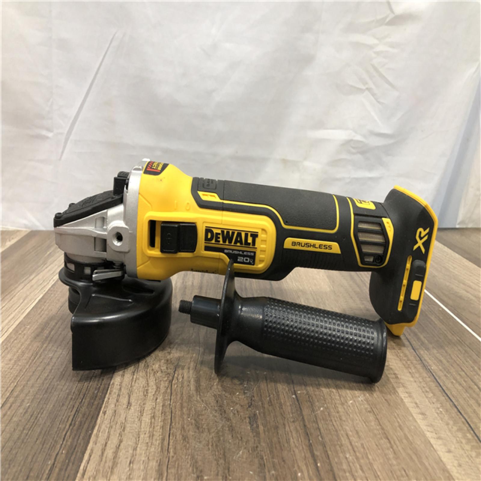 AS-IS DEWALT 20V MAX XR Cordless Brushless 4.5 in. Slide Switch Small Angle Grinder with Kickback Brake (Tool Only)