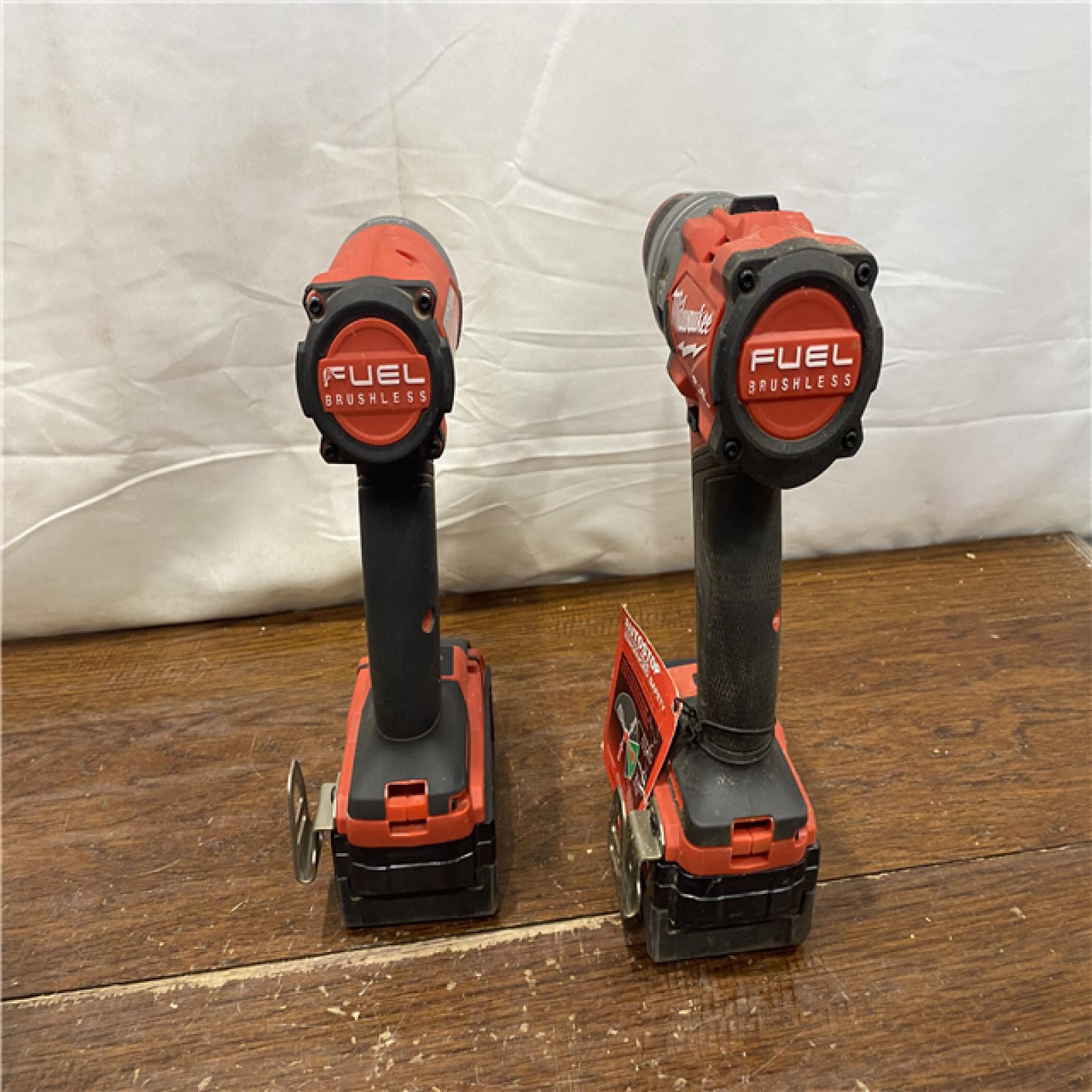 AS-IS MILWAUKEE M18 FUEL 18V Lithium-Ion Brushless Cordless Hammer Drill and Impact Driver Combo Kit (2-Tool) with 2 Batteries