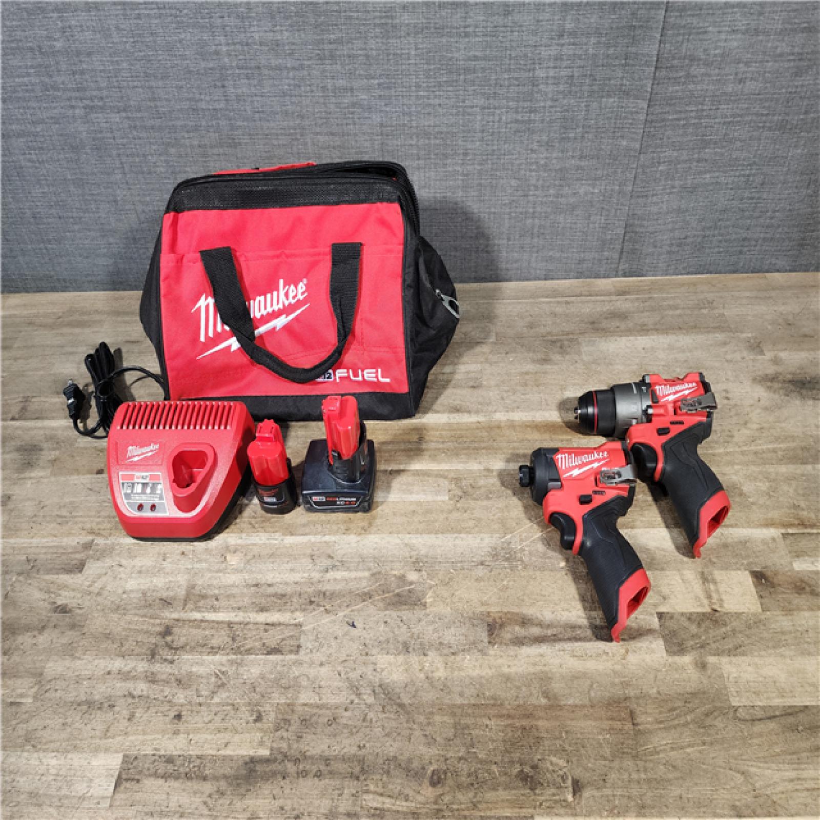 HOUSTON LOCATION - AS-IS Milwaukee FUEL 12-Volt Lithium-Ion Brushless Cordless Hammer Drill and Impact Driver Combo Kit