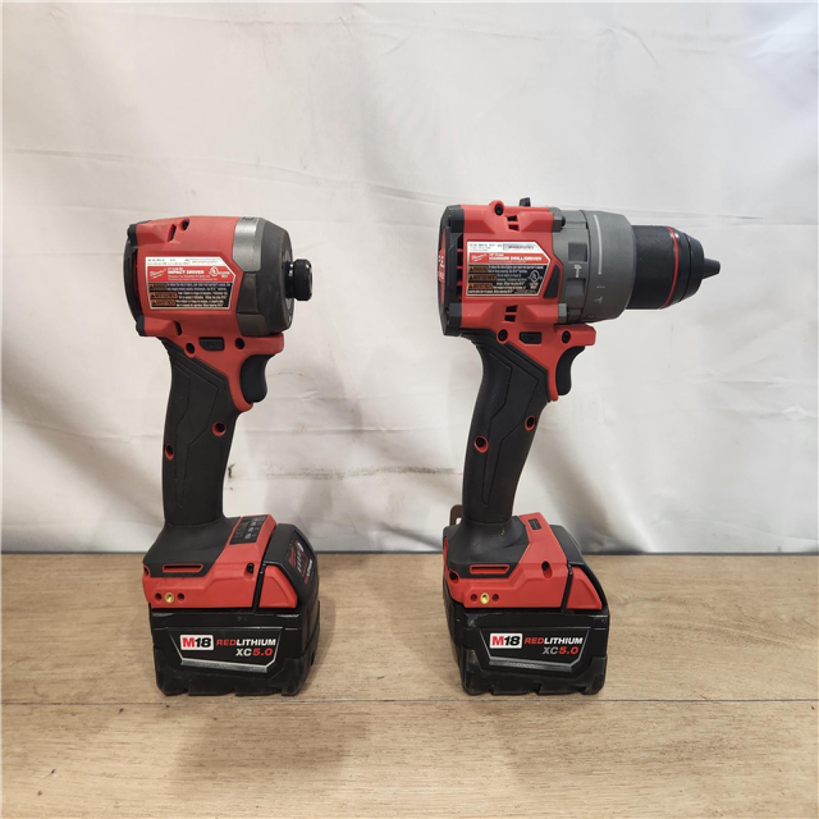 AS-IS- Milwaukee FUEL 18V Lithium-Ion Brushless Cordless Hammer Drill and Impact Driver Combo Kit