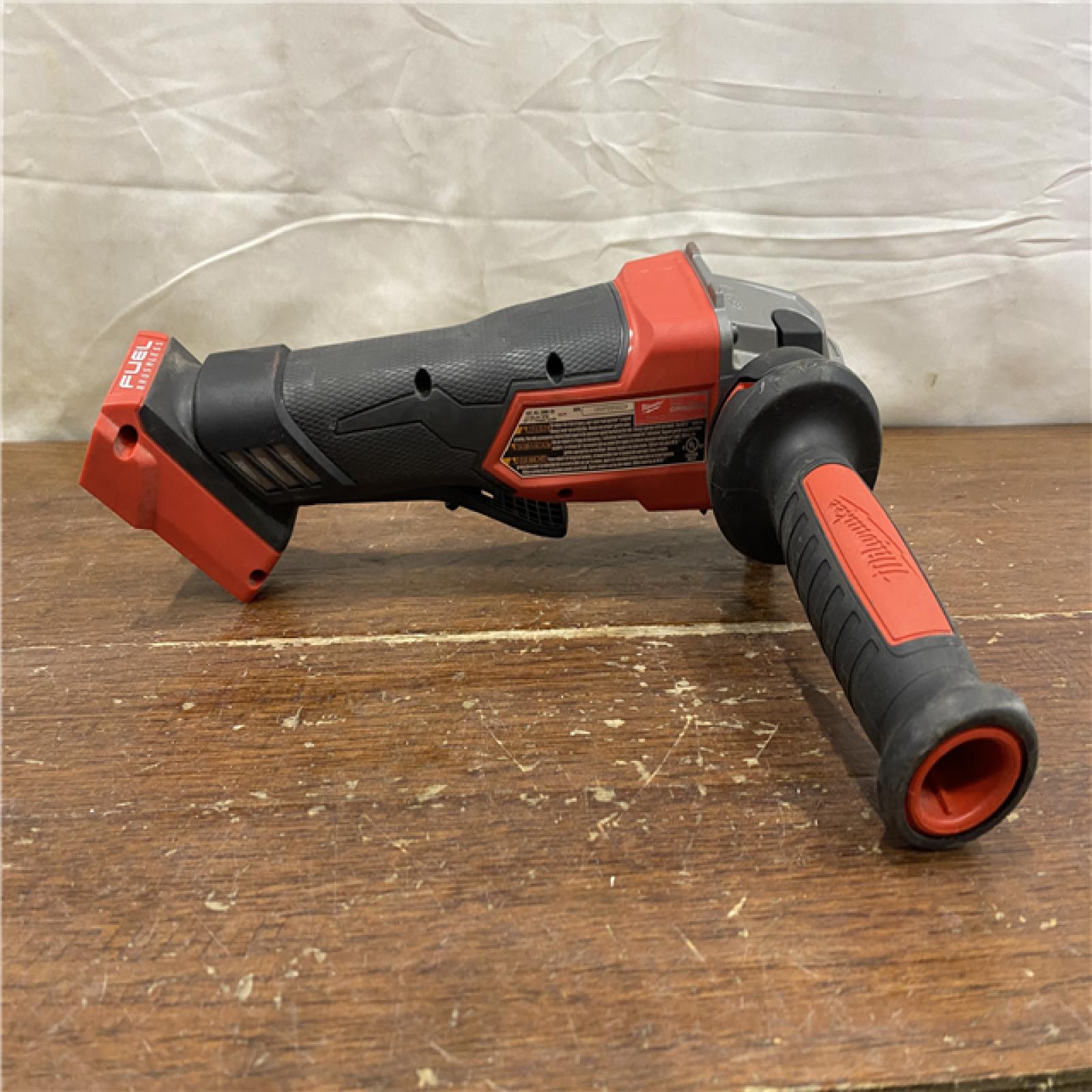 AS-IS Milwaukee 2880-20 M18 FUEL 18-Volt Lithium-Ion Brushless Cordless 4-1/2 in./5 in. Grinder W/Paddle Switch (Tool-Only)