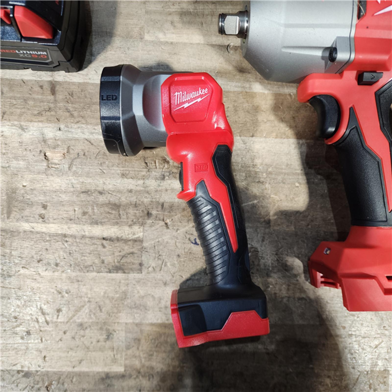HOUSTON LOCATION - AS-IS MILWAUKEE 7 TOOL COMBO KIT W/ (2) BATTERY & CHARGER