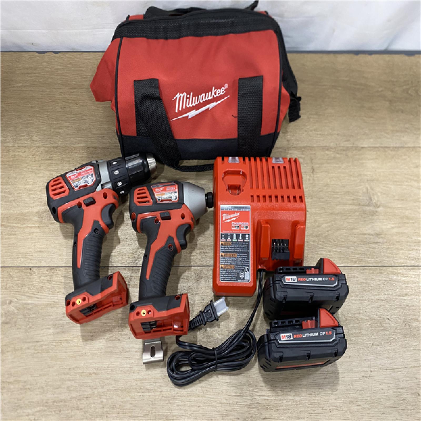 AS-IS Milwaukee 18V Lithium-Ion Cordless Drill Driver/Impact Driver Combo Kit