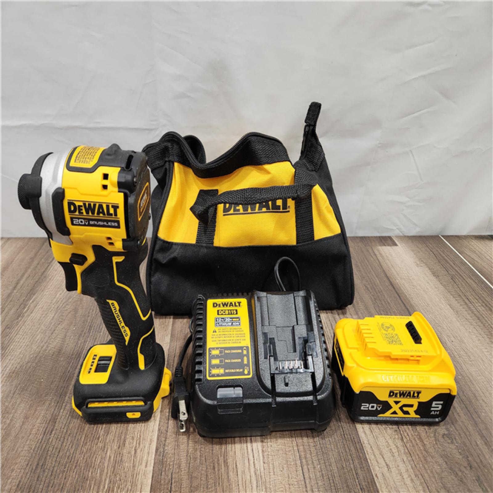 AS-IS DEWALT ATOMIC 20V MAX Lithium-Ion Cordless 1/4 in. Brushless Impact Driver Kit, 5 Ah Battery, Charger, and Bag