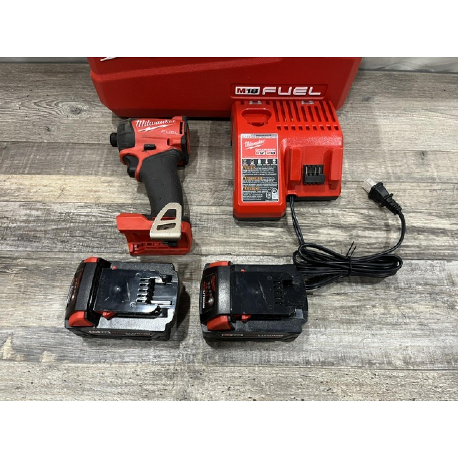 AS-IS Milwaukee FUEL SURGE 18V Lithium-Ion Brushless Cordless 1/4 in. Hex Impact Driver Kit
