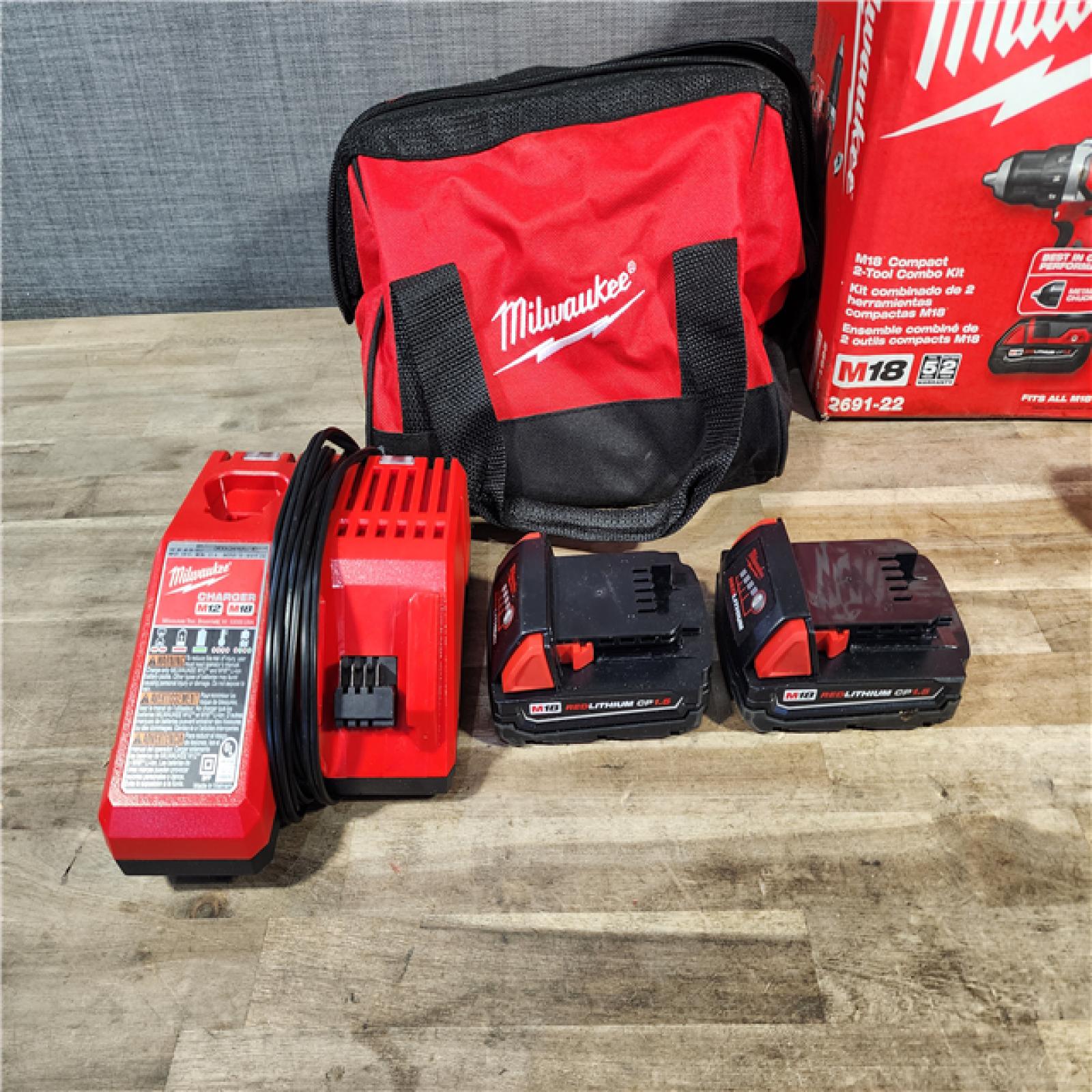 HOUSTON LOCATION - AS-IS Milwaukee 18V Cordless Brushed 2-Tool Drill/Driver and Impact Driver Kit